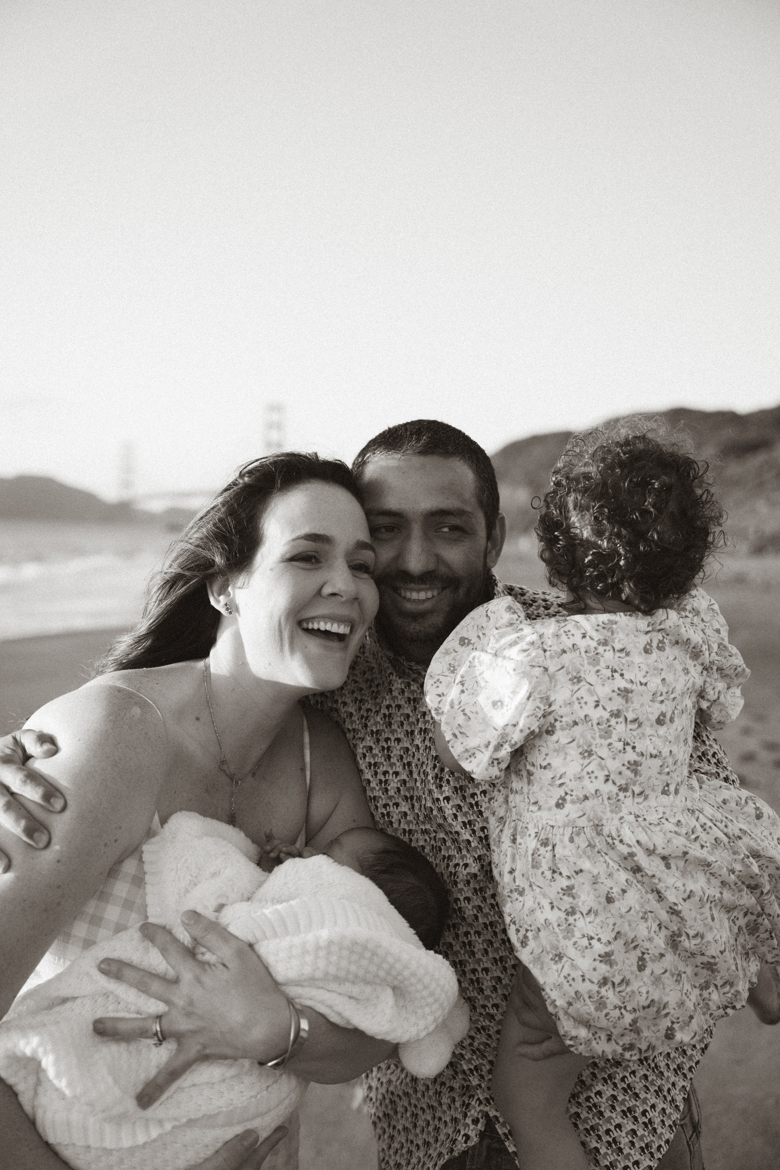 Bri’s growing family at Baker Beach. Soulo Photography | San Francisco Bay Area Based Photographer