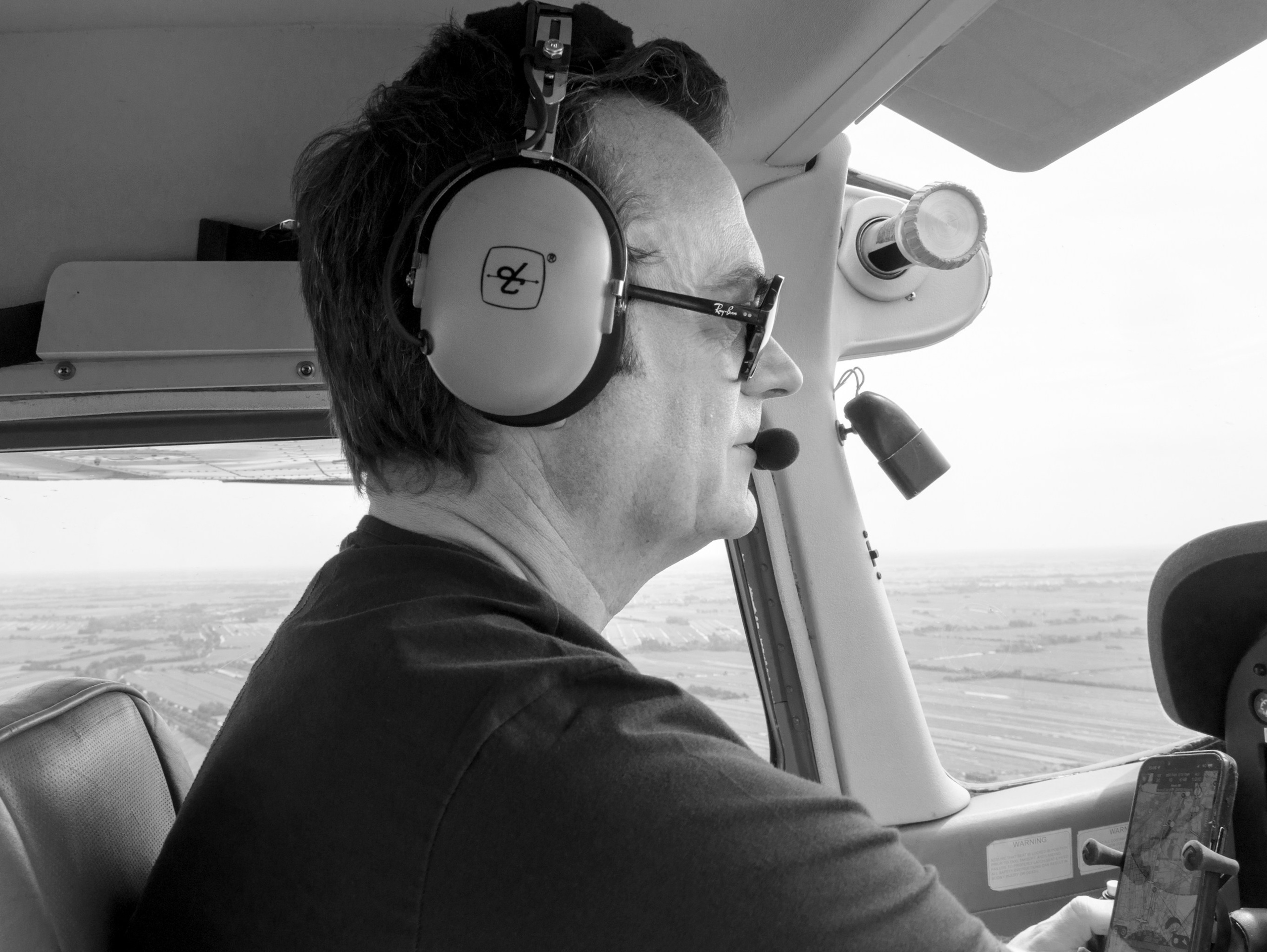 Een fotoshoot van een piloot en vliegtuigen. Éclat Fotos. Exclusieve portretfotografieservice