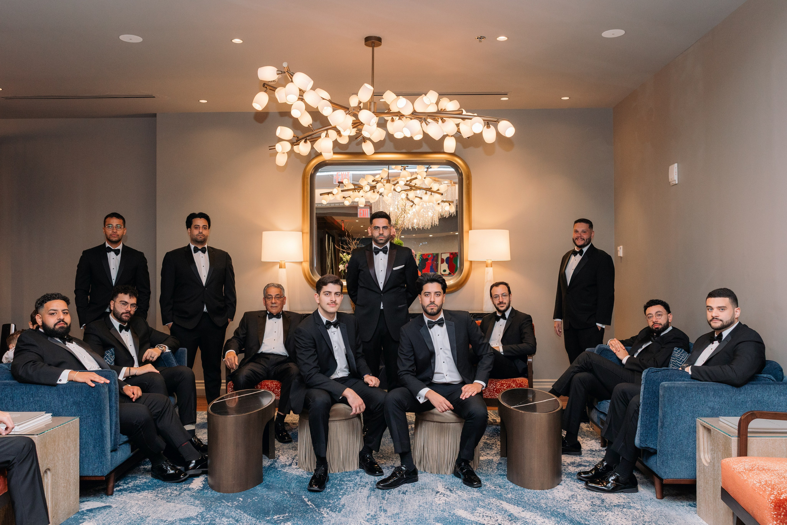 Wedding party gathered at the altar inside an elegant church