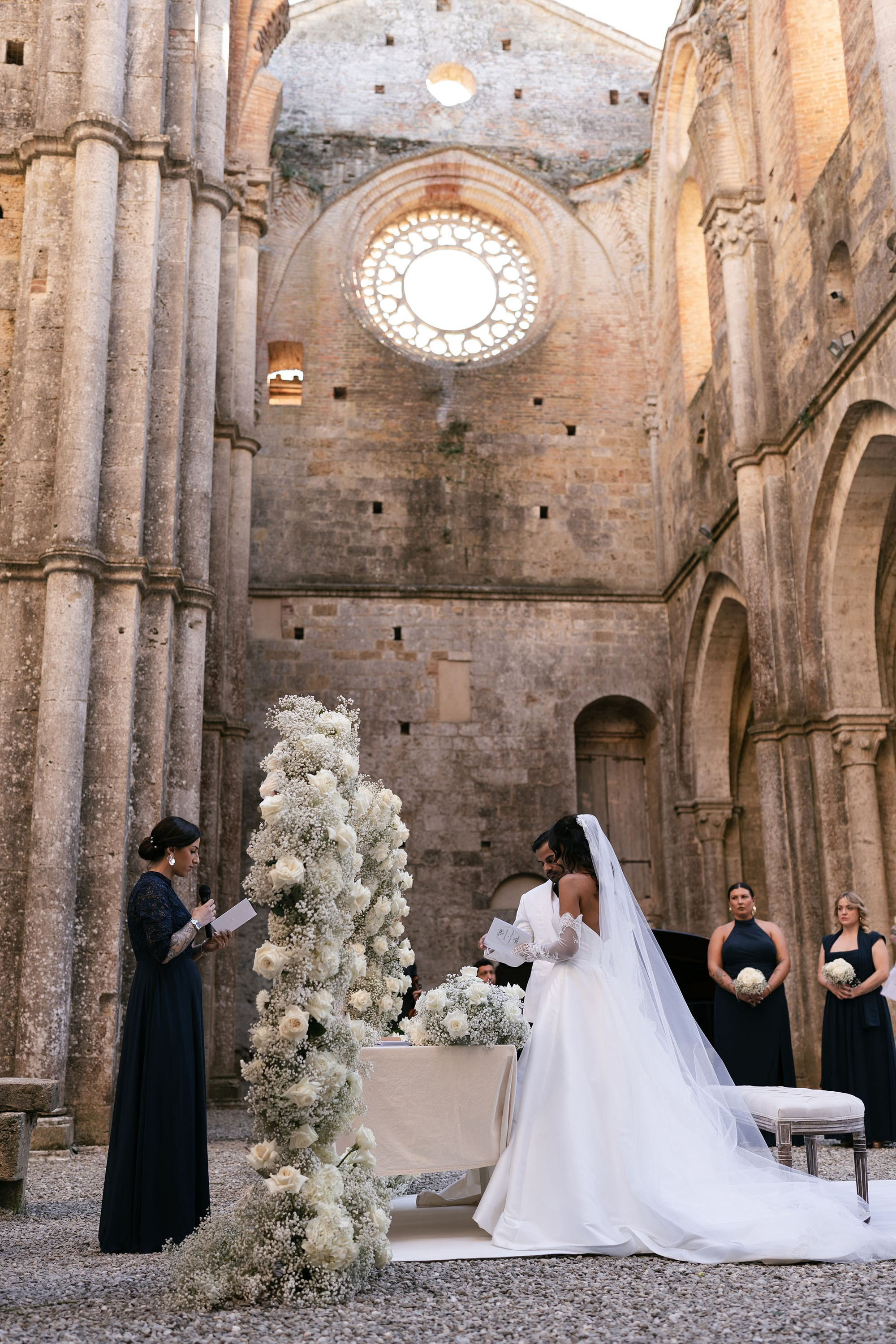 Ginevra and Avi — Abbazia di San Galgano, Tuscany. Destination Wedding Photographers and content creators based in Spain