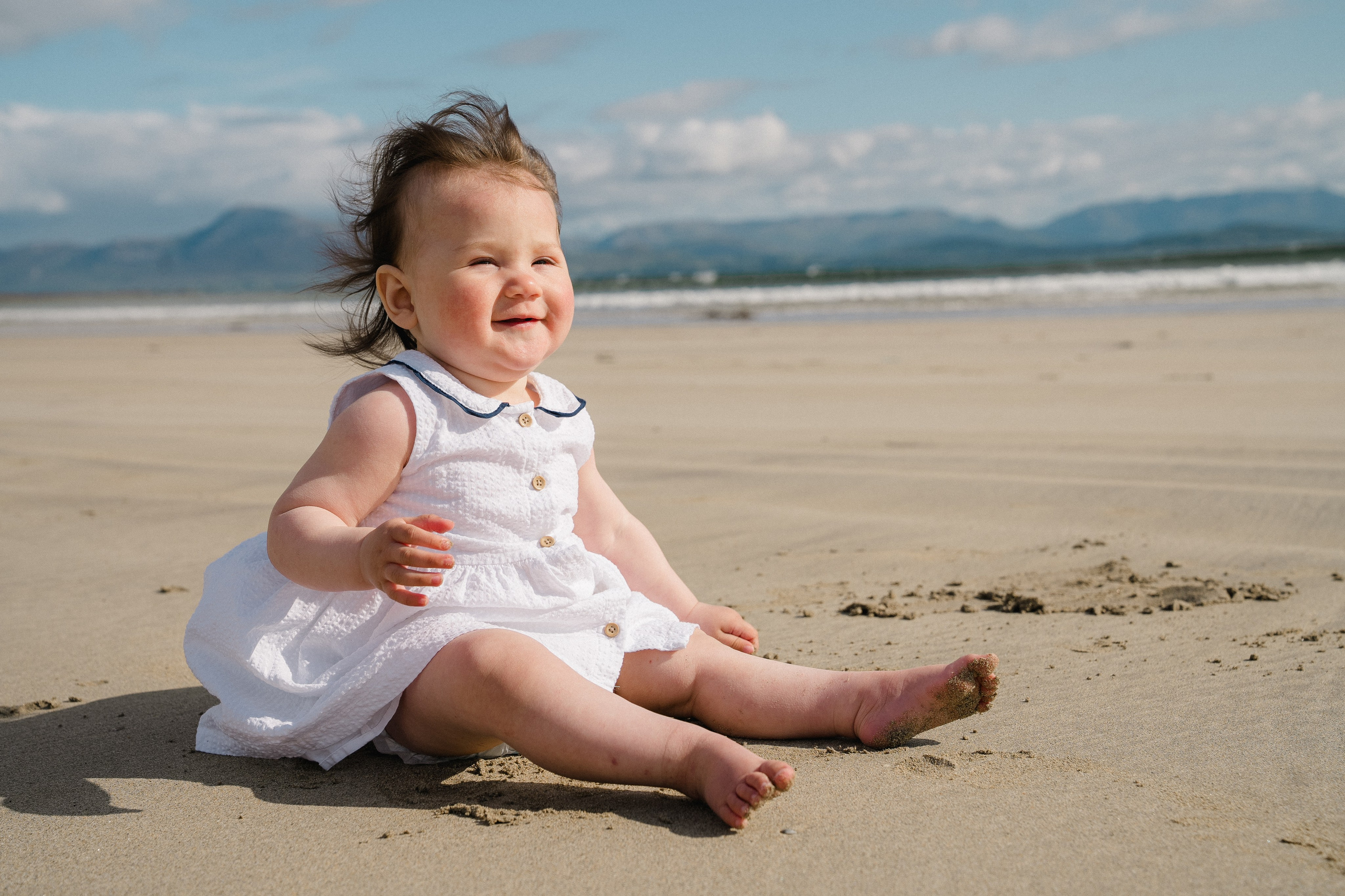 Darya and Mia at the ocean. Wedding and family photographer Ireland