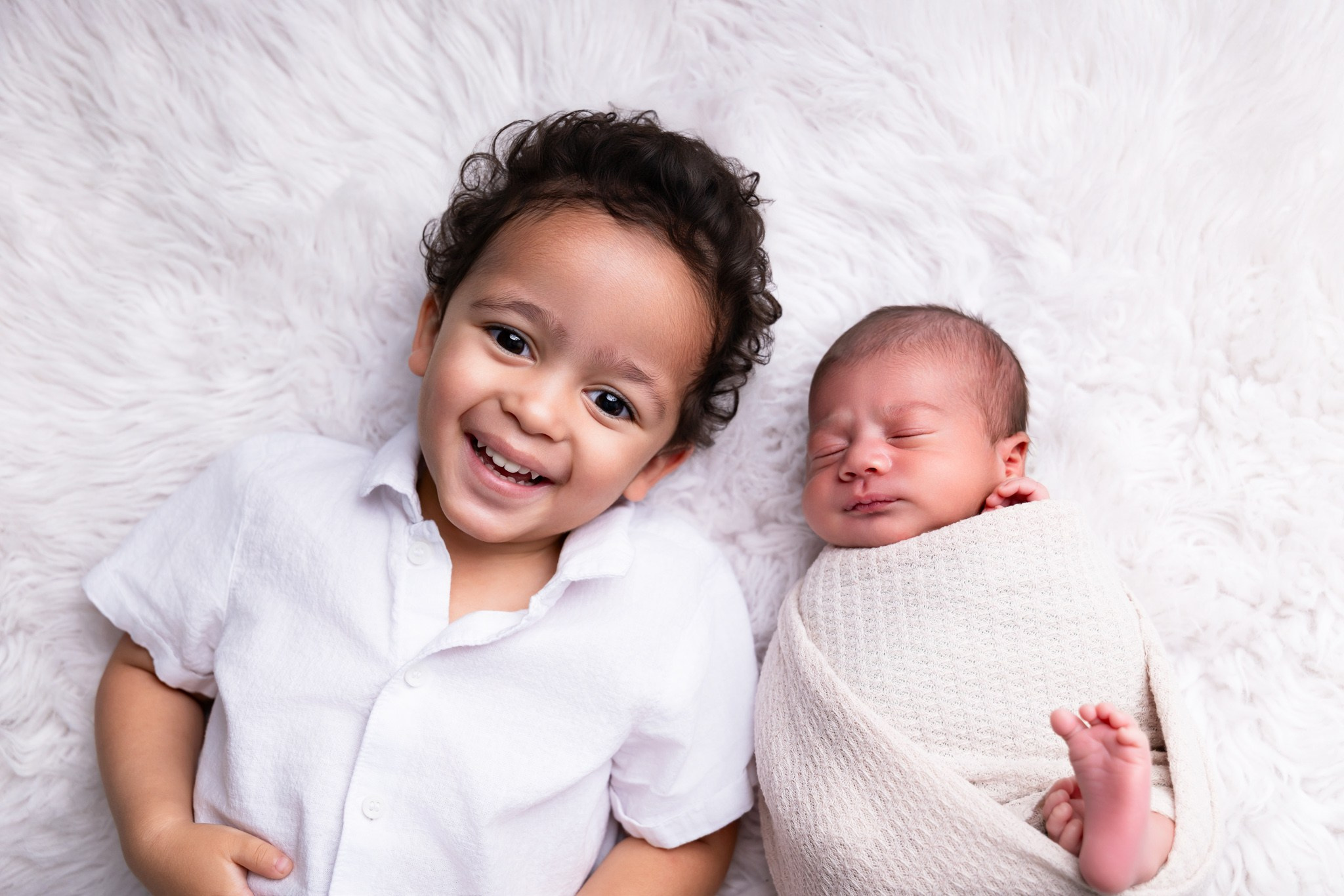 Dante Newborn Photoshoot. Professional family, maternity & newborn photographer in North Charleston, SC, creating timeless portraits