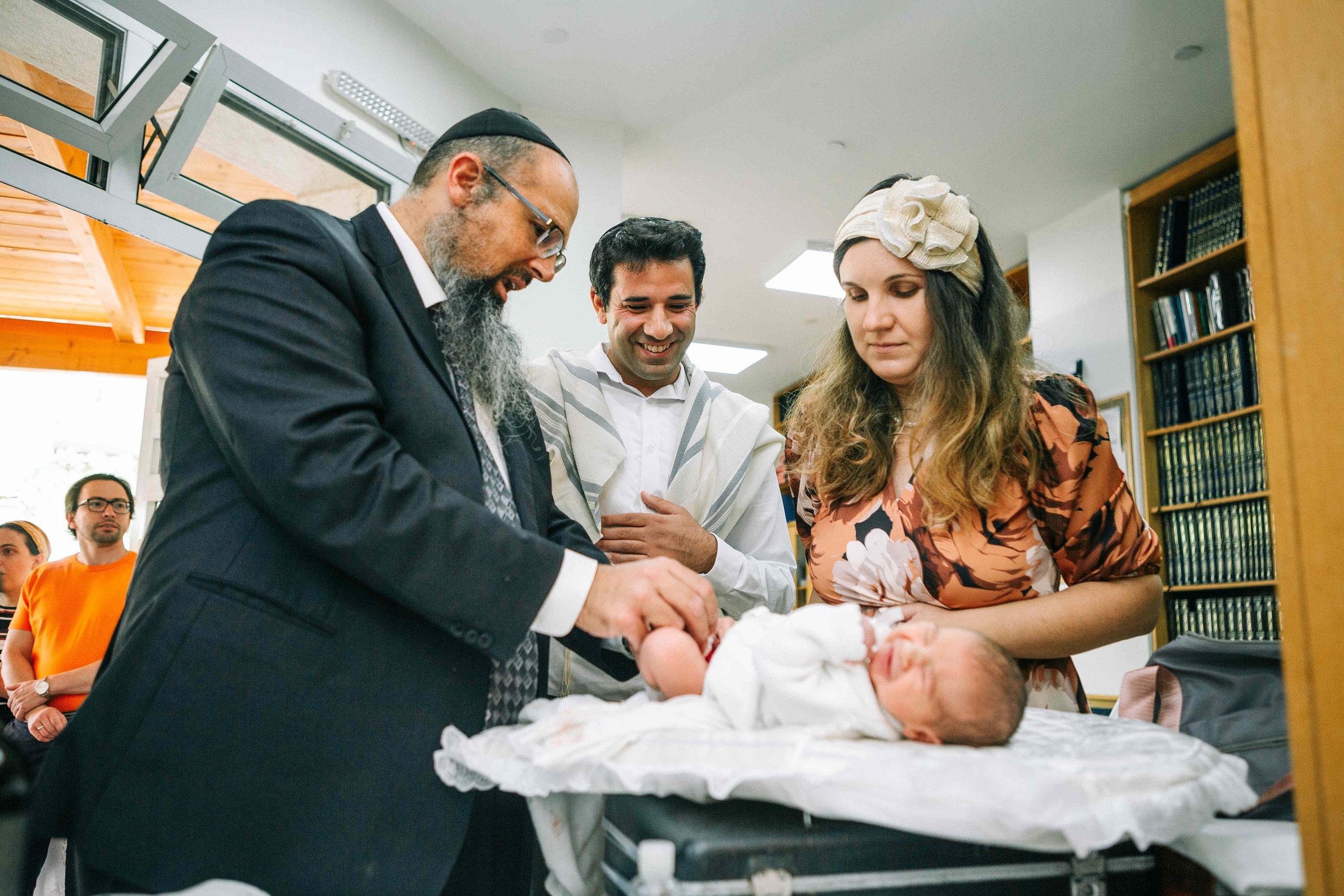 BRITH MILA IN THE SMALL SYNAGOGUE. PHOTOGRAPHER IN ISRAEL