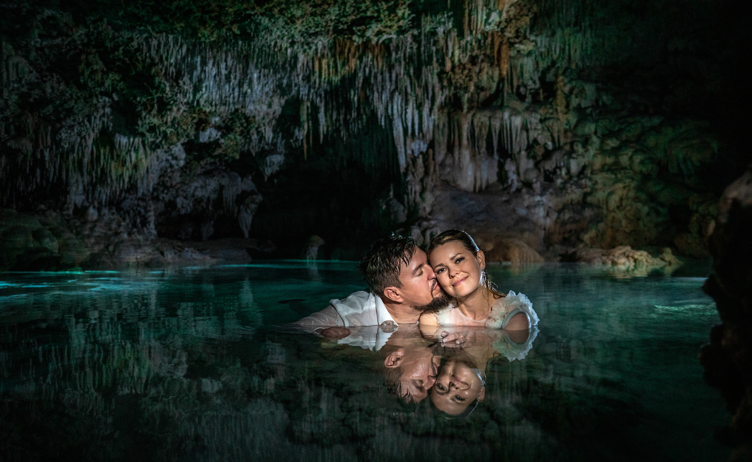 Emotional bride and groom moment in Playa del Carmen cenote