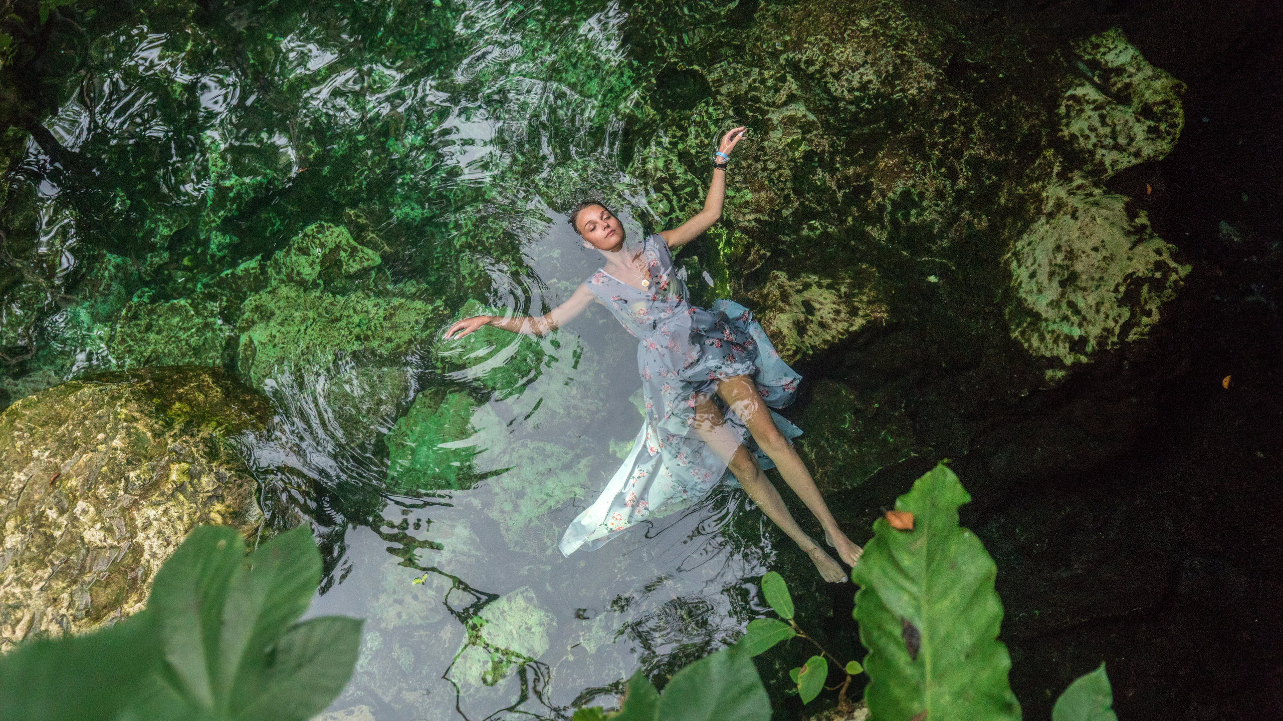 Mystic and emotional portrait of woman in Mexican water