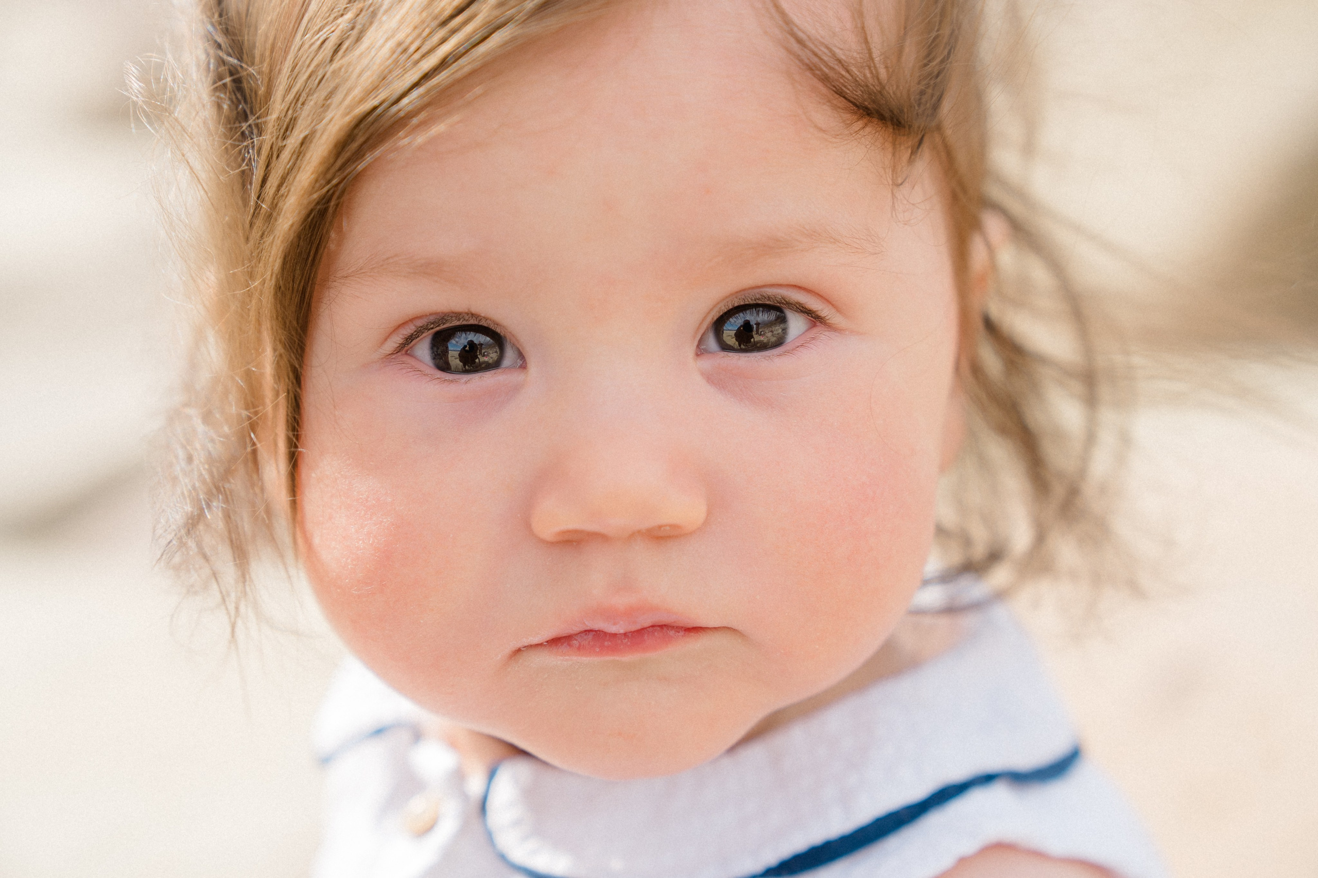 Darya and Mia at the ocean. Wedding and family photographer Ireland