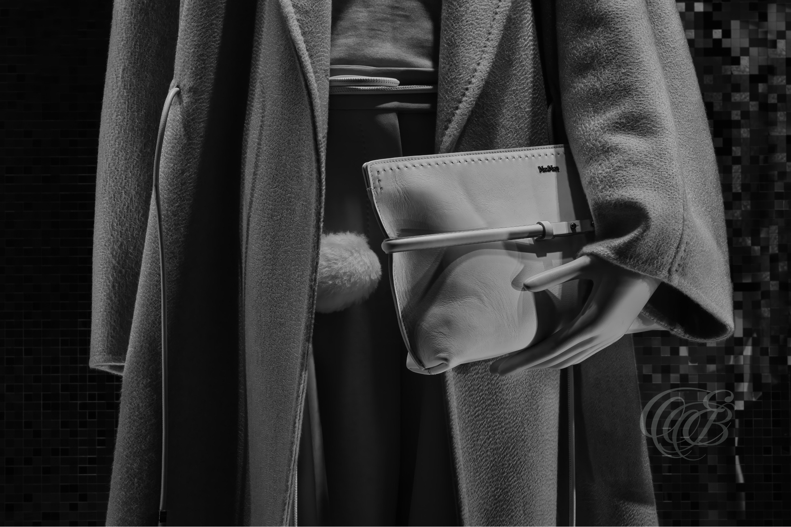 Rome, Italy – Max Mara window display in black and white showing luxury fashion storefront with reflective glass and curated interior arrangement – fashion photography, Max Mara Rome boutique – Eduardo Bartoli Photography.