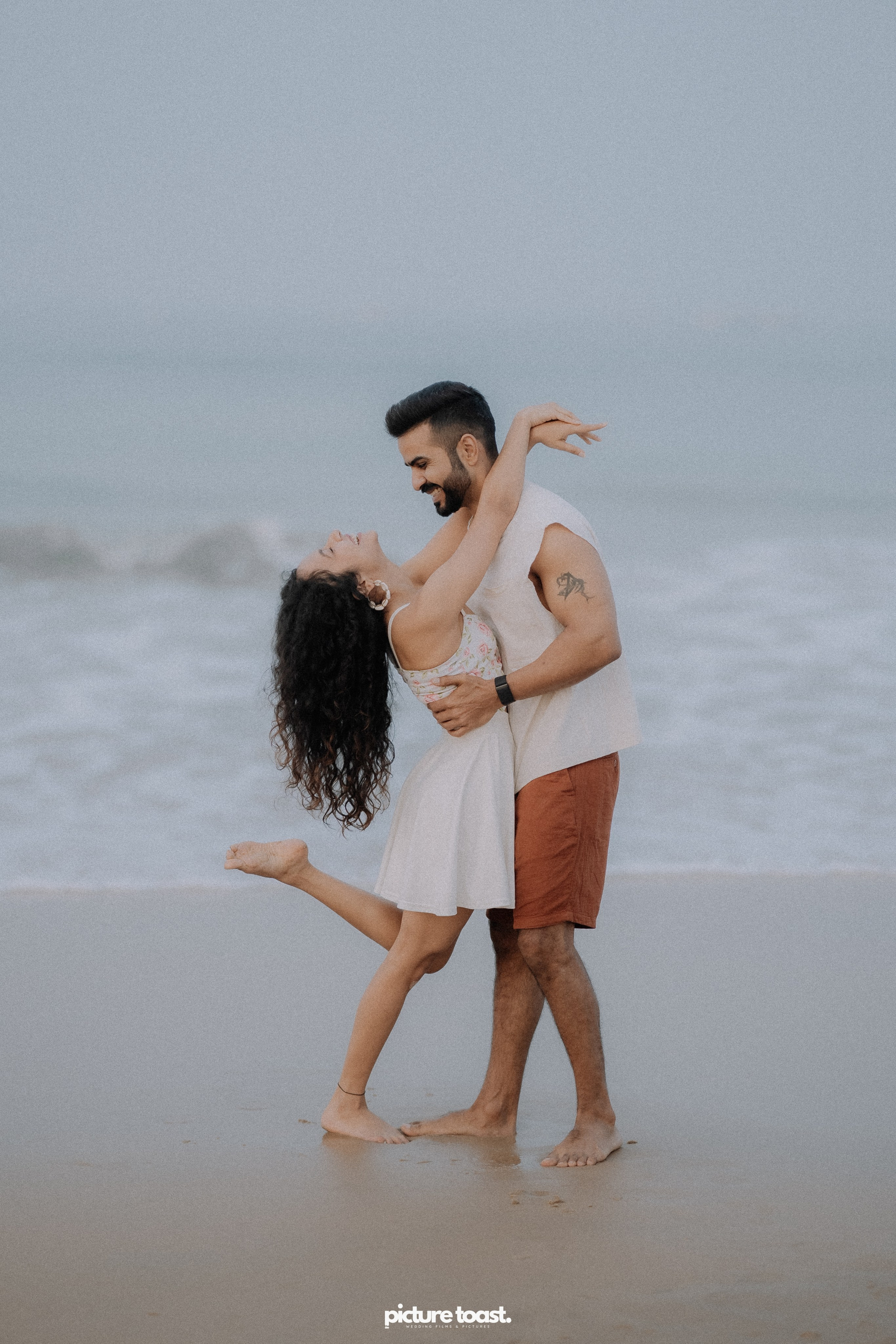 Love In The Beach. Fine art Wedding Photographers in India & Canada