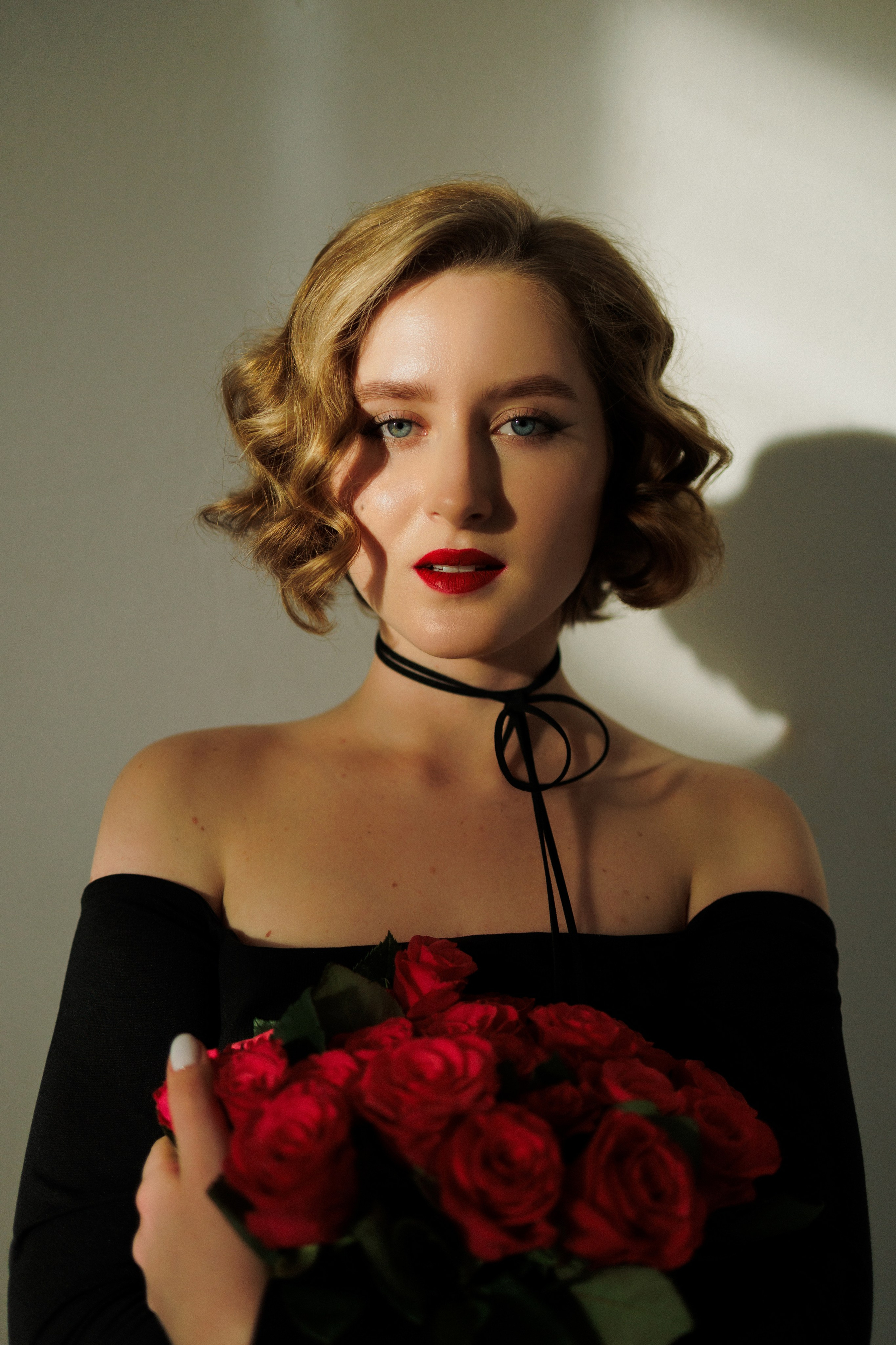 Soulful Studio Portrait. Woman in a Black Dress with Red Roses. Kristina Kozheltsova- Soulful Portrait&Lifestyle&Love Story Photographer in Leipzig, Germany