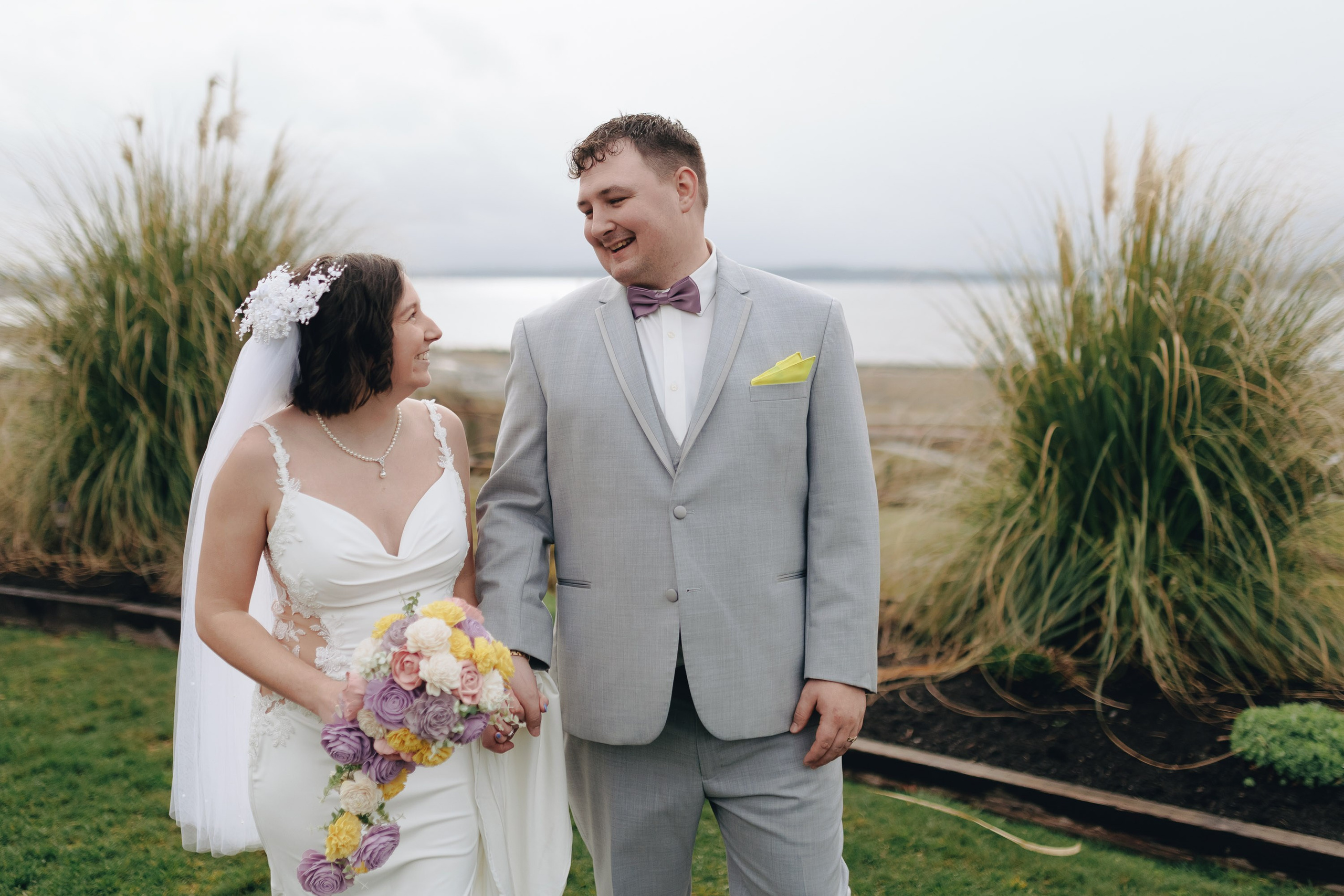 Groom smiling outdoors, classic wedding portrait