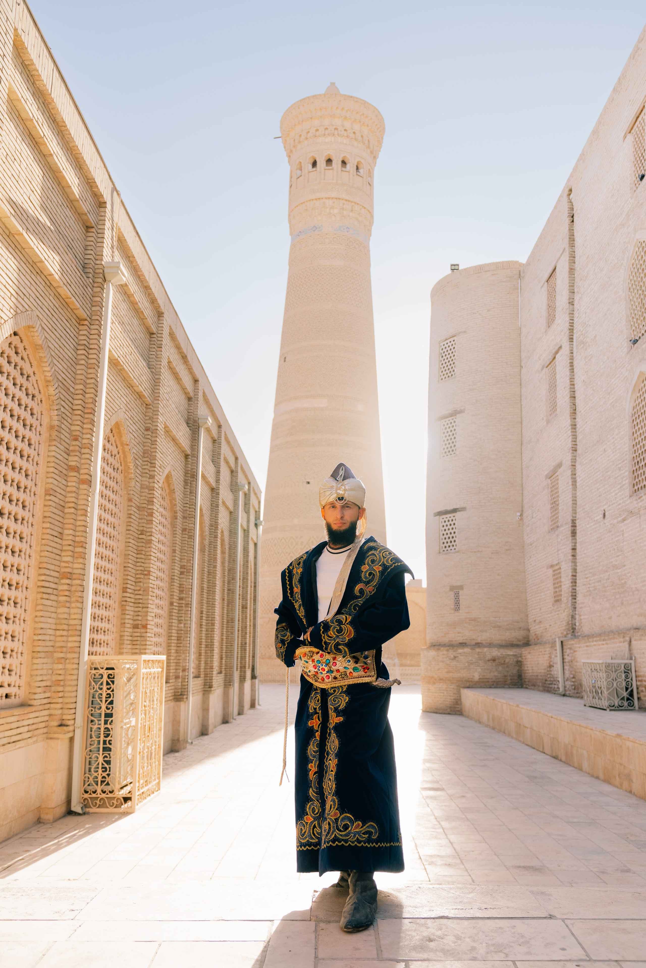 Men's photoshoot in ethnic clothing in Bukhara