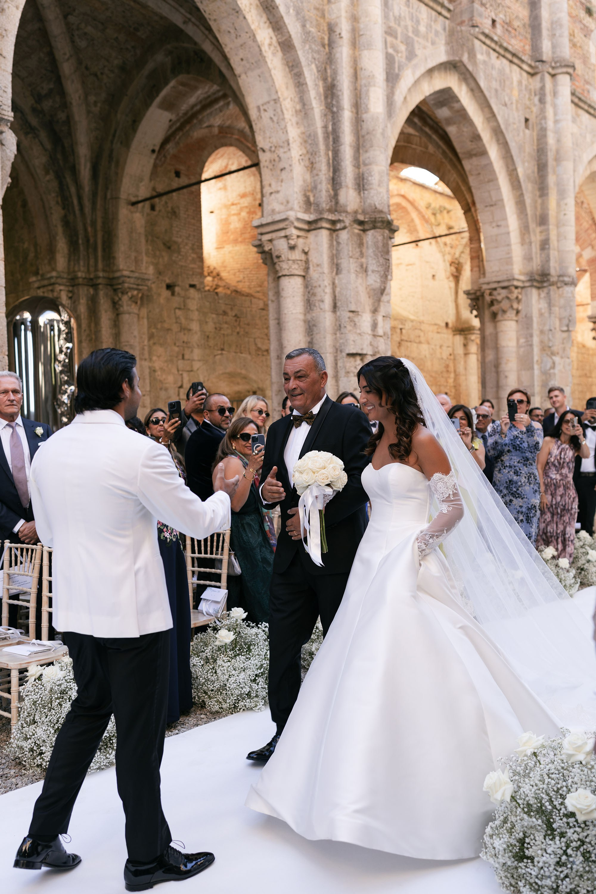 Ginevra and Avi — Abbazia di San Galgano, Tuscany. Destination Wedding Photographers and content creators based in Spain