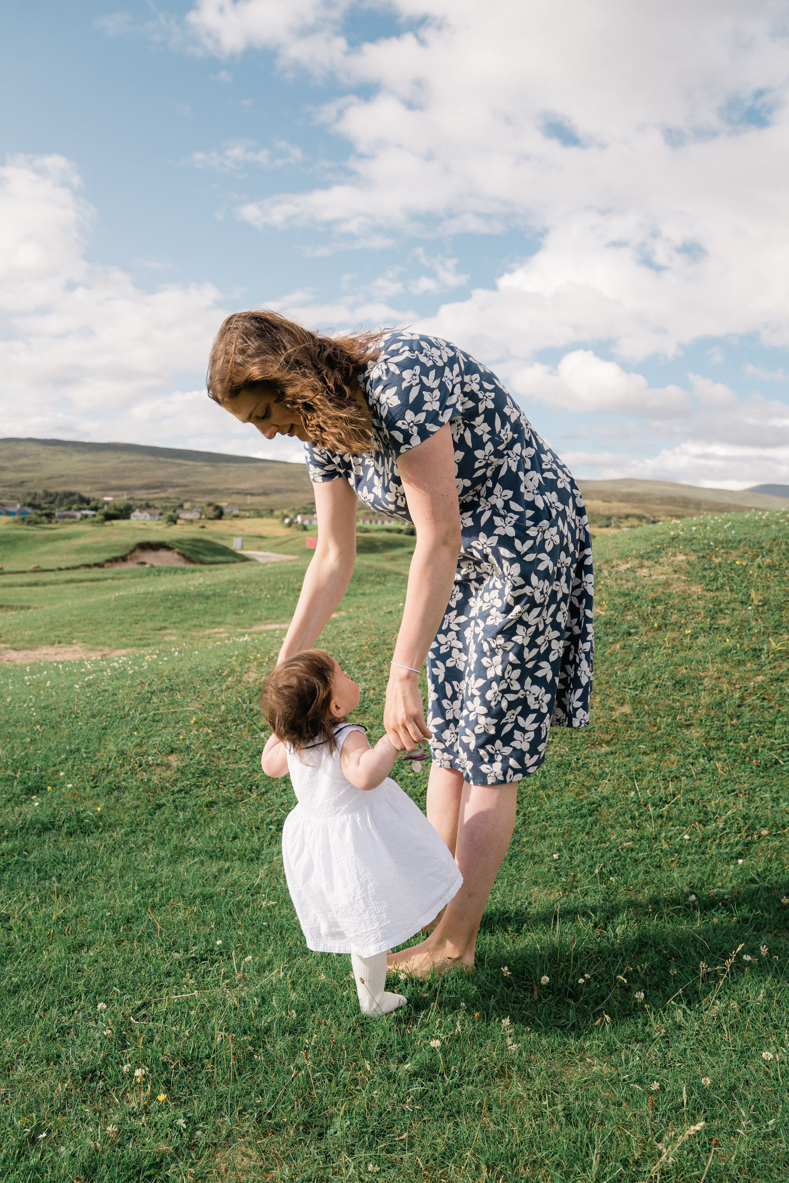 Darya and Mia at the ocean. Wedding and family photographer Ireland