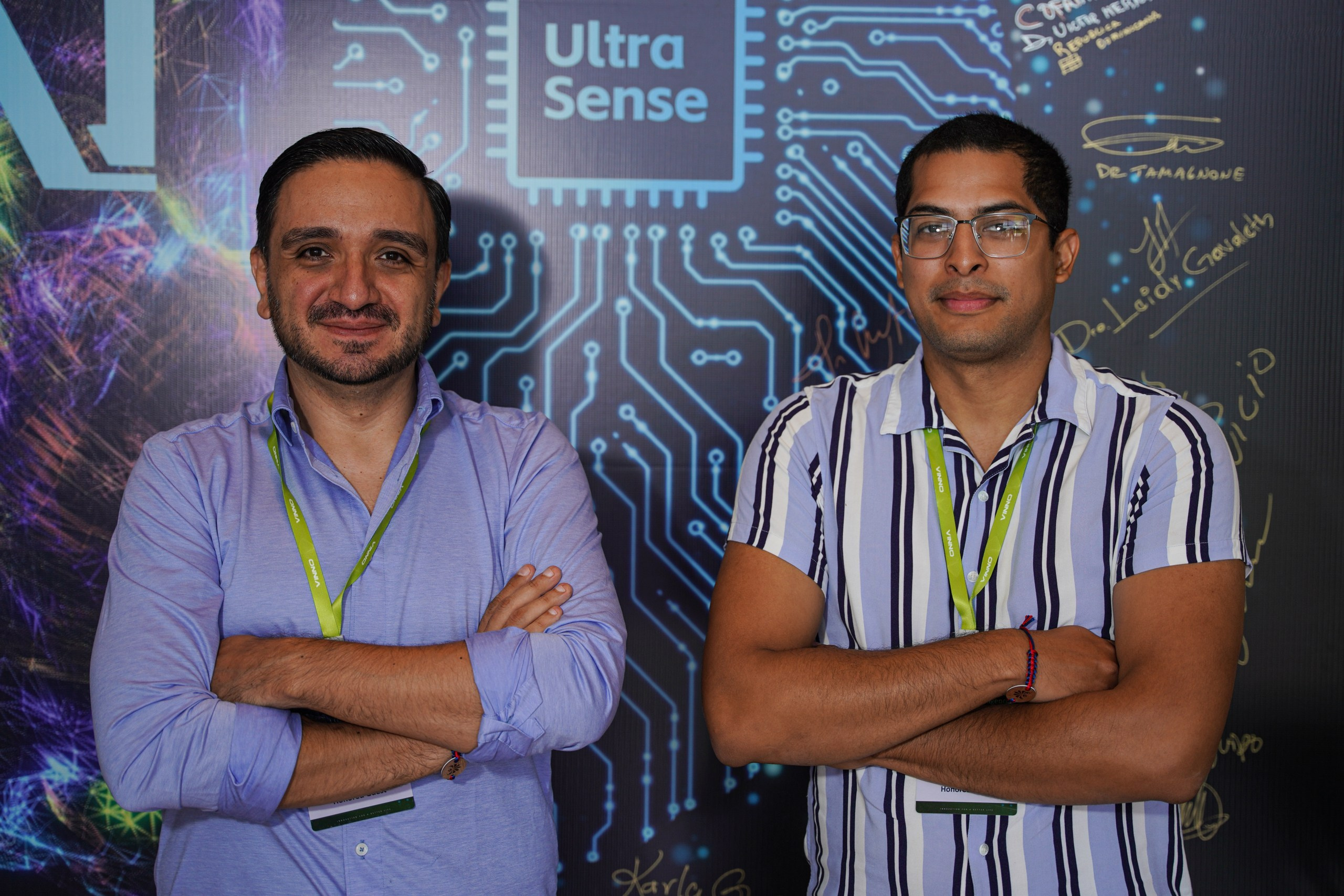 Event attendee posing for quick professional photo.