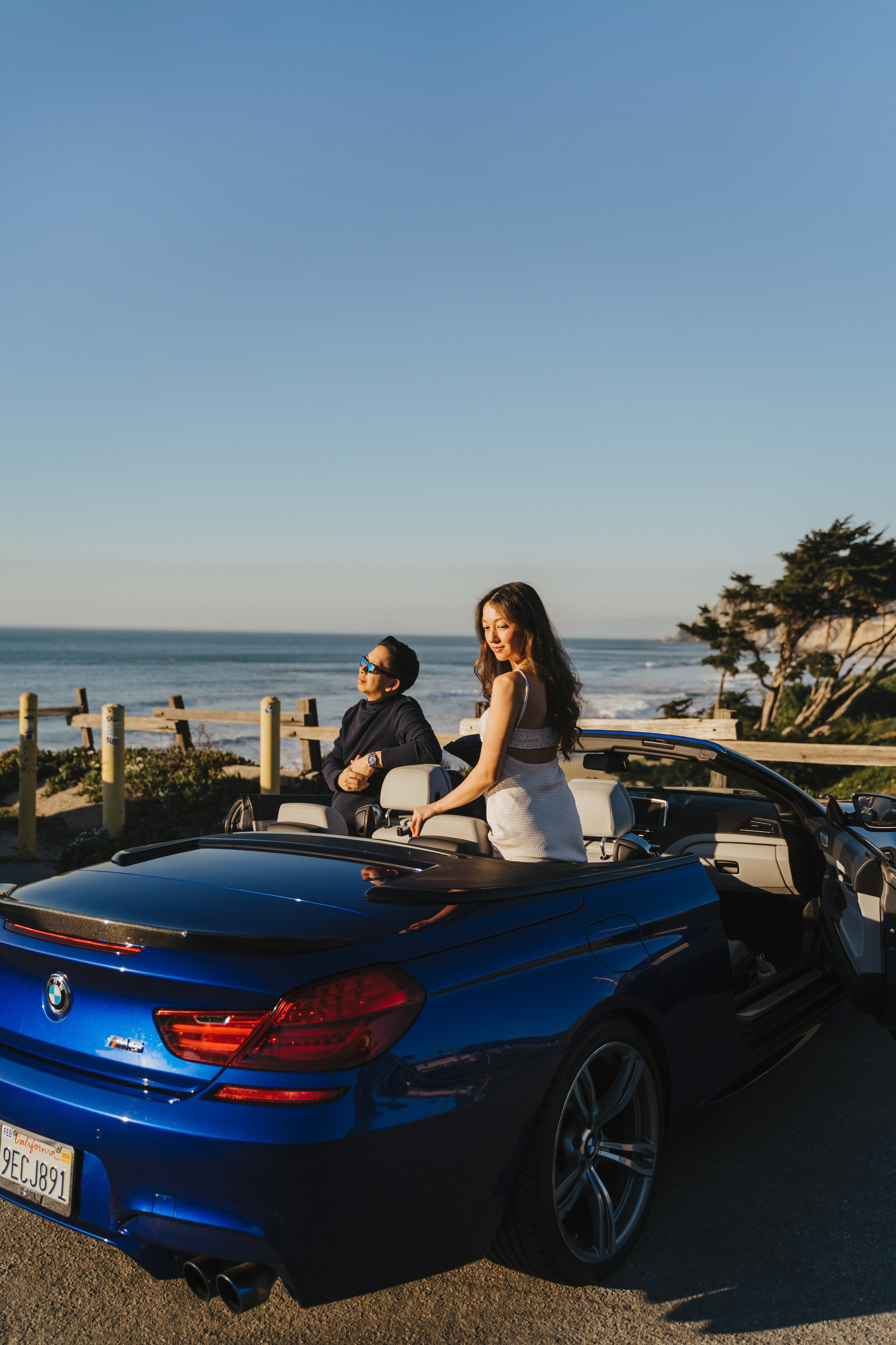 A photo shoot on the San Francisco beach at sunset. Engagement session. 