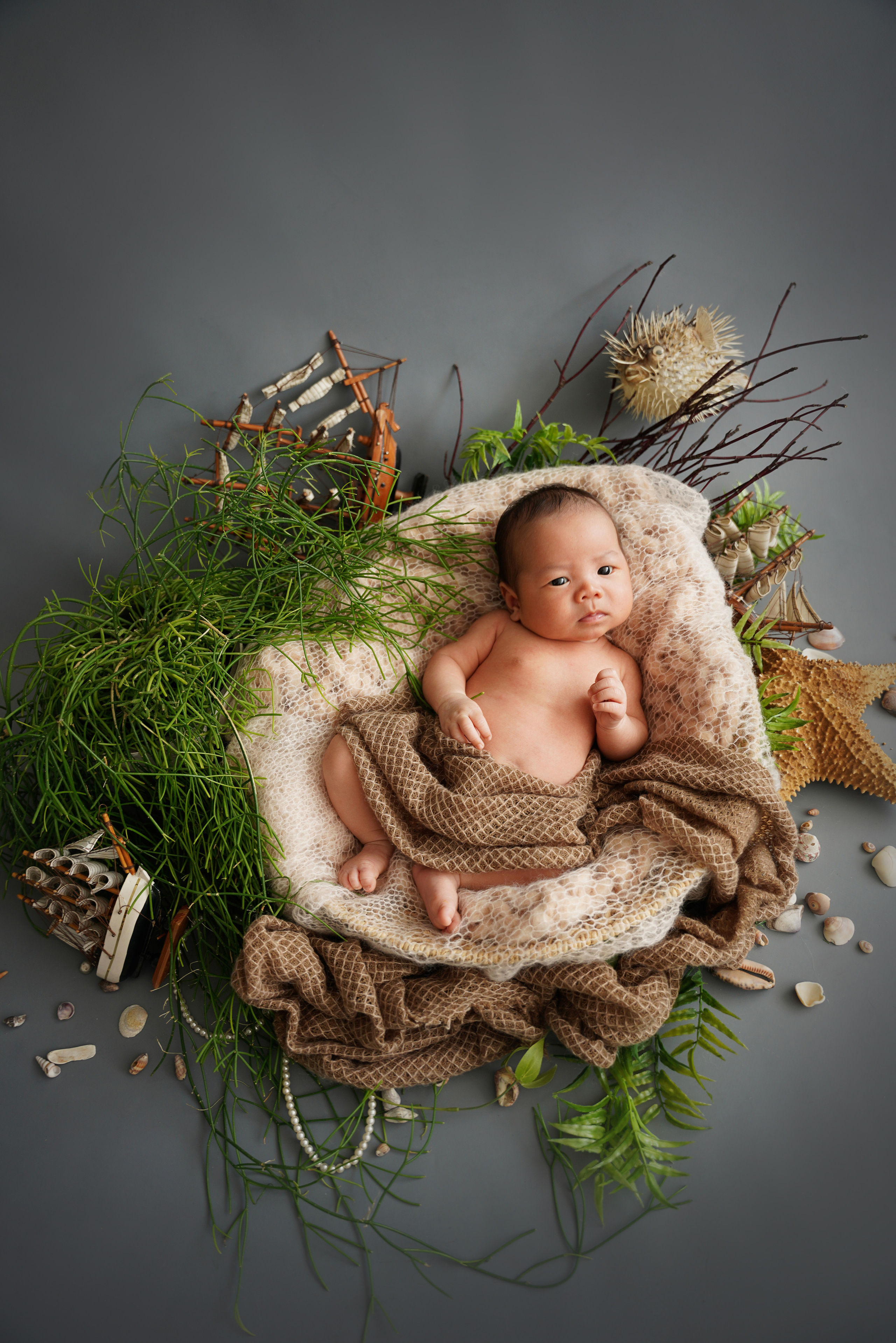 künstlerische Verarbeitung der Fotografie eines Neugeborenen