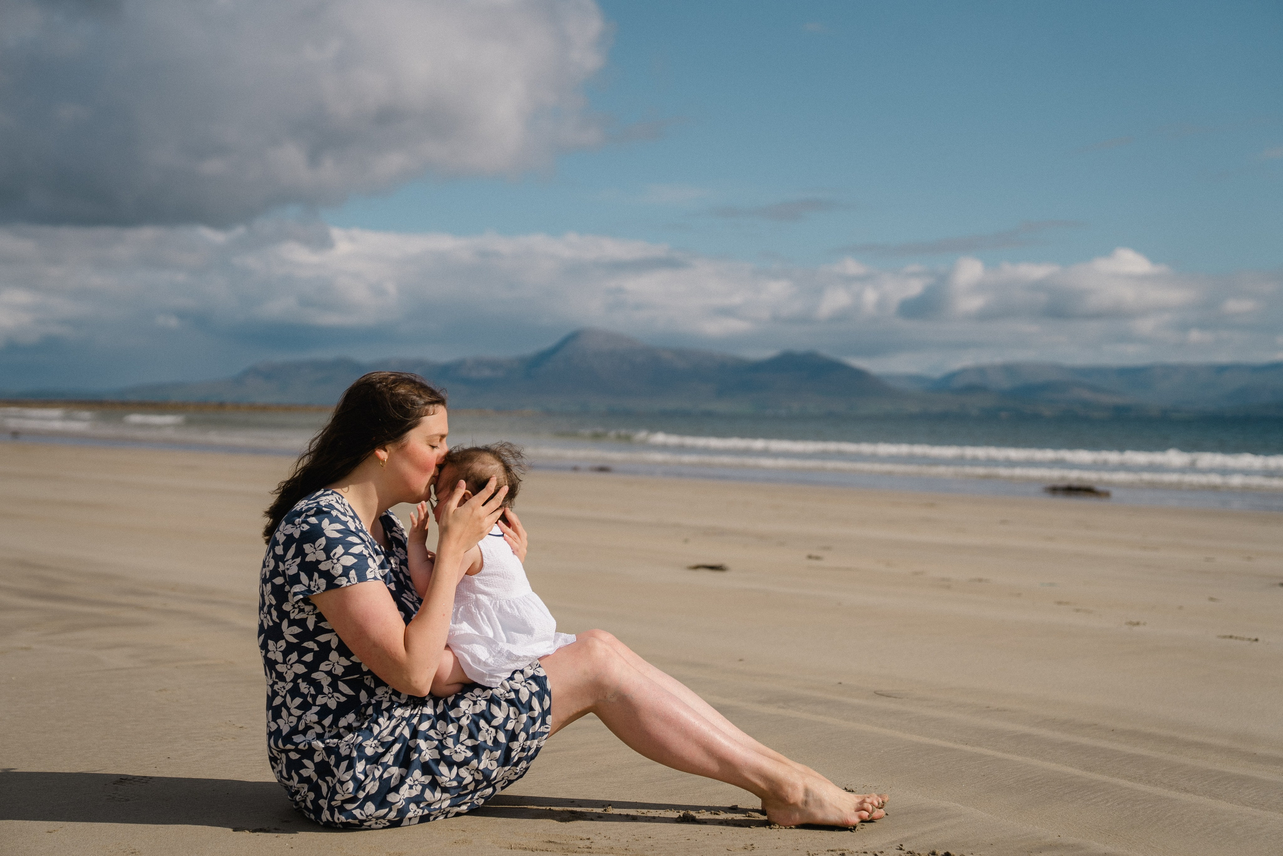 Darya and Mia at the ocean. Wedding and family photographer Ireland
