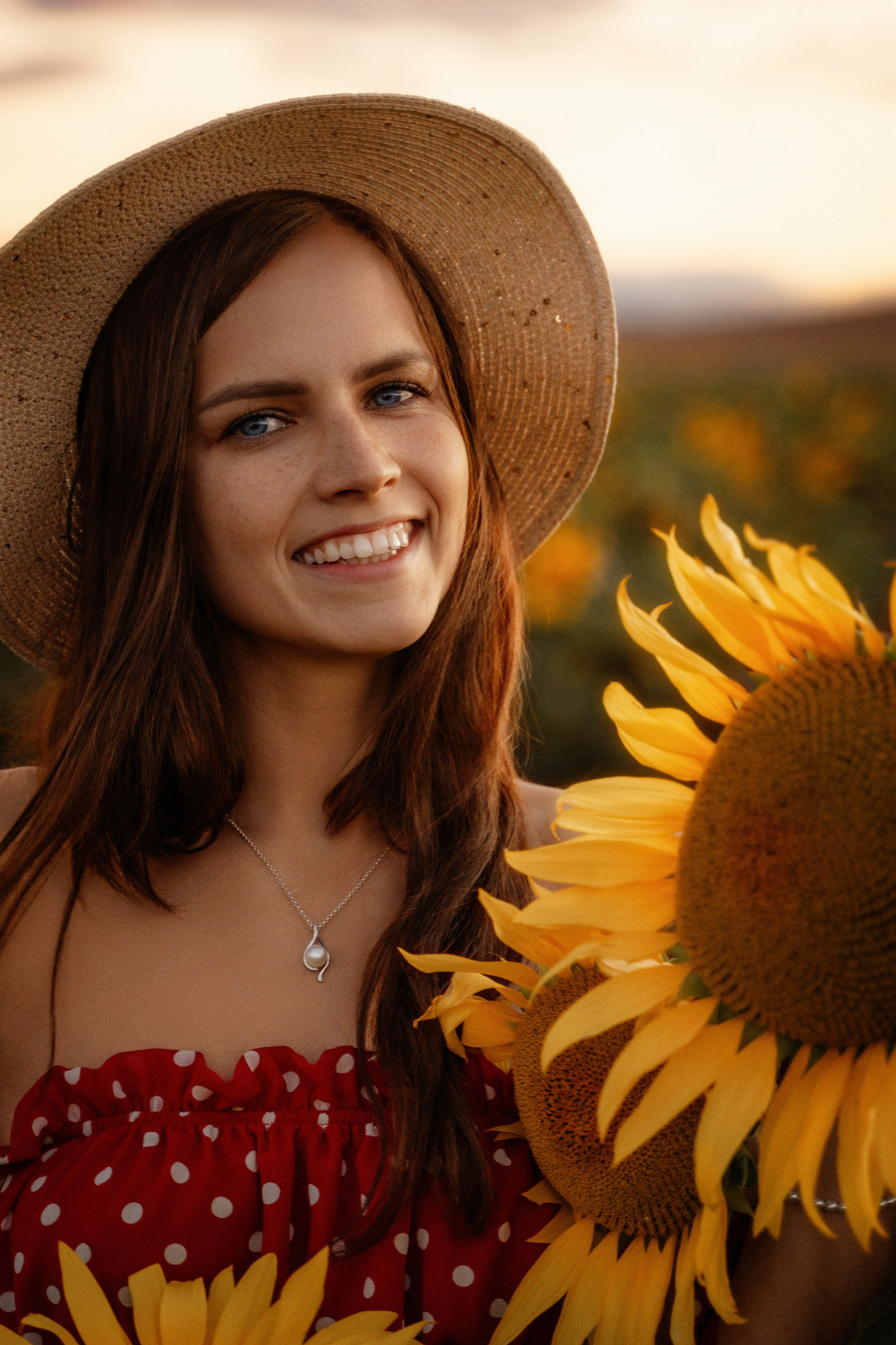 Beautiful model posing in sunflower field at sunset, Marbella portrait photography