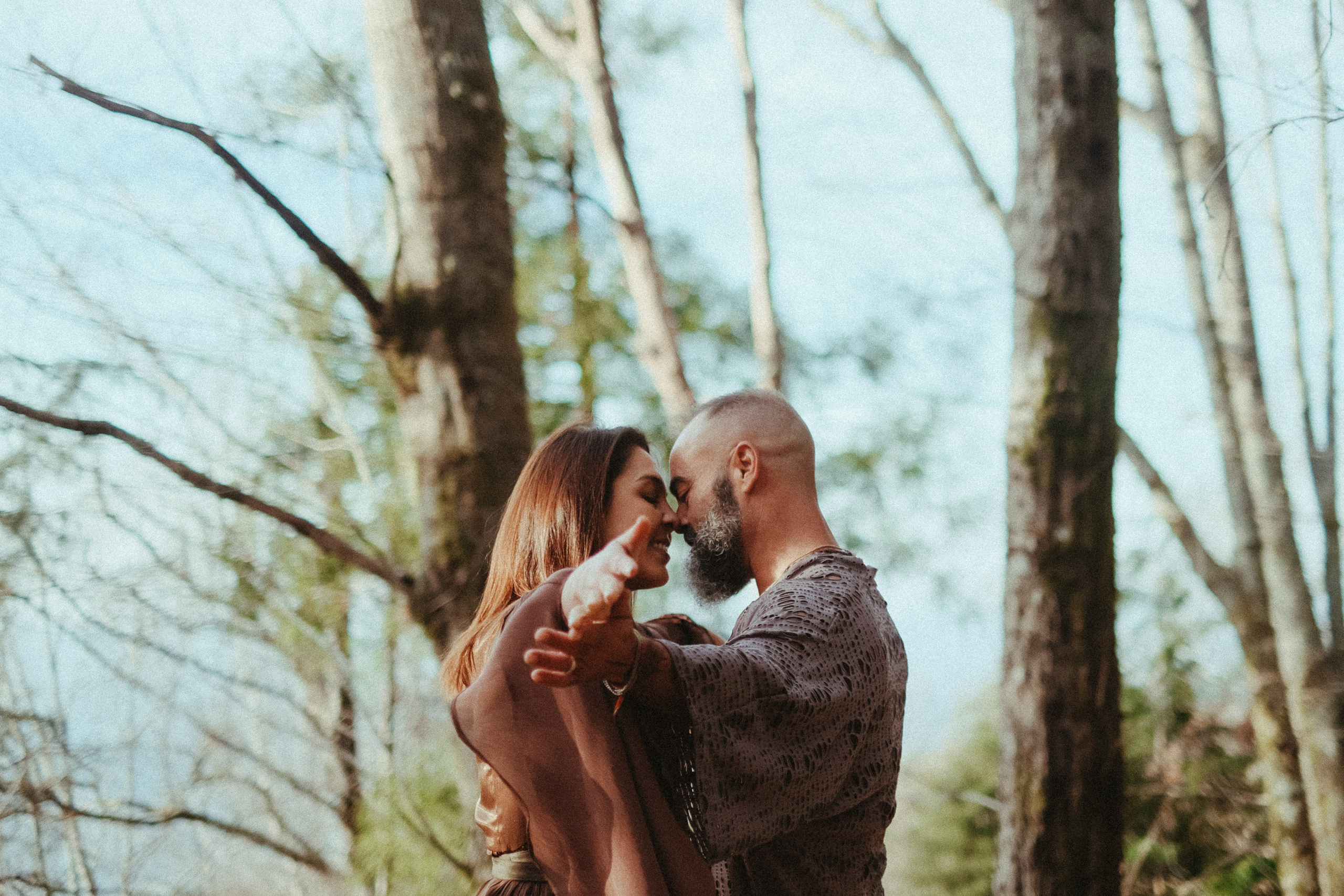 intimate couple embracing in nature during Portugal pre wedding shoot