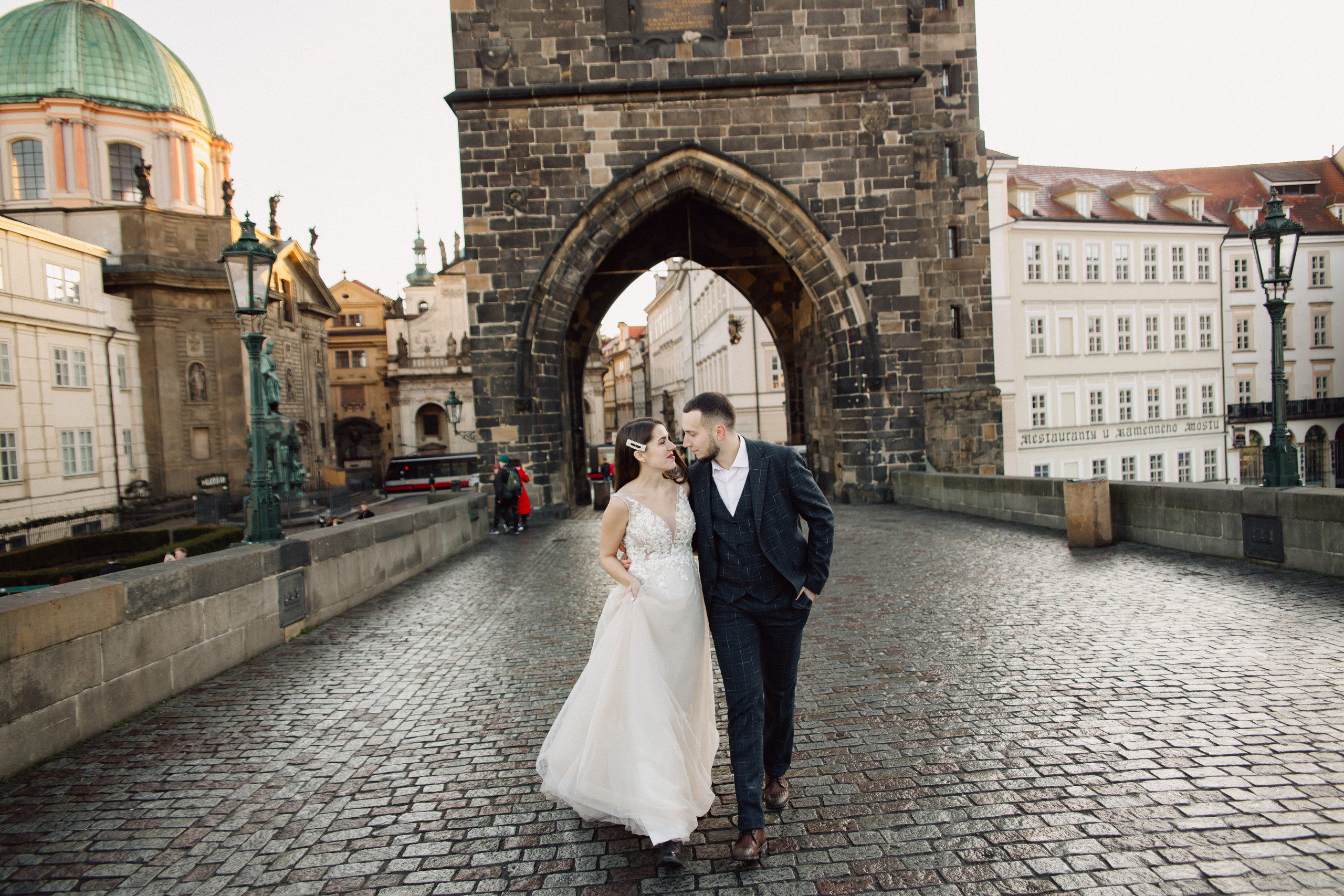 Christmas elopement of a couple in Prague. Wedding and portrait photographer in Poland Vitali Frozen