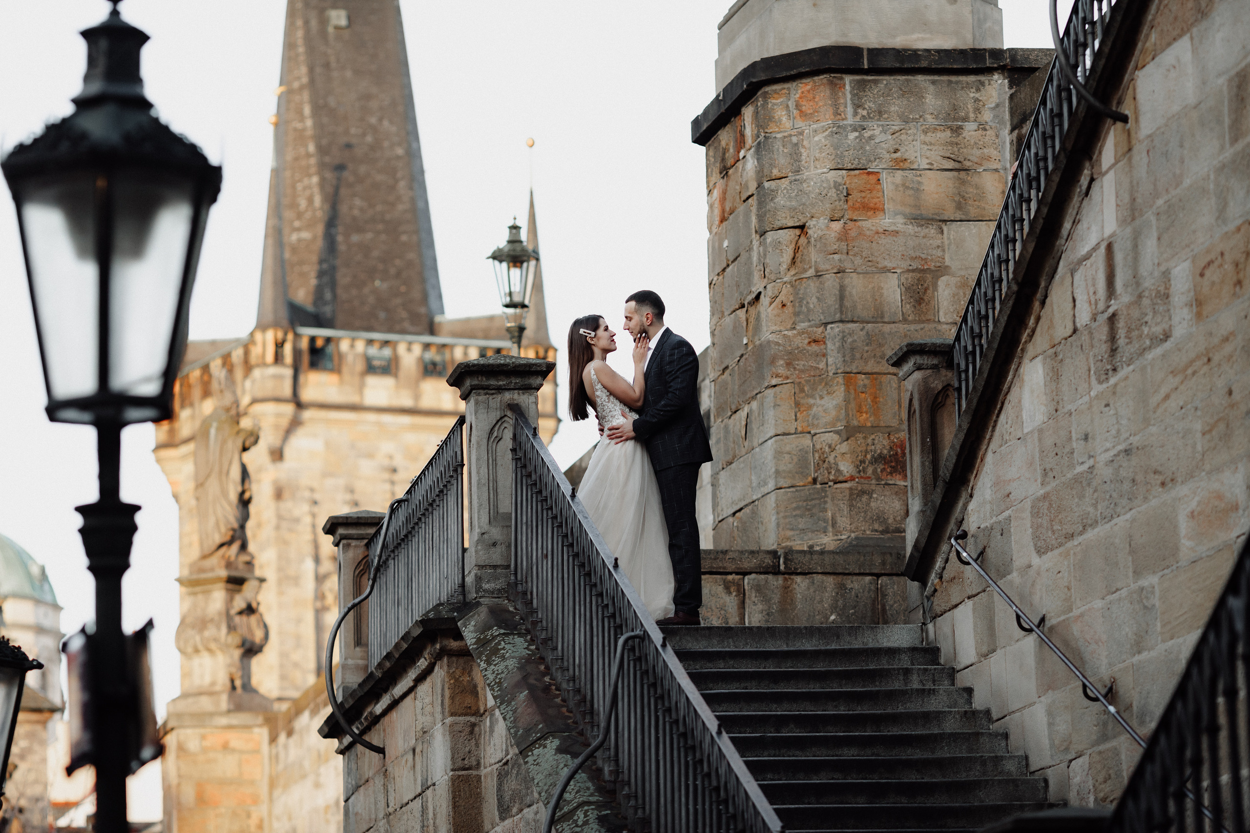 Christmas elopement of a couple in Prague. Wedding and portrait photographer in Poland Vitali Frozen