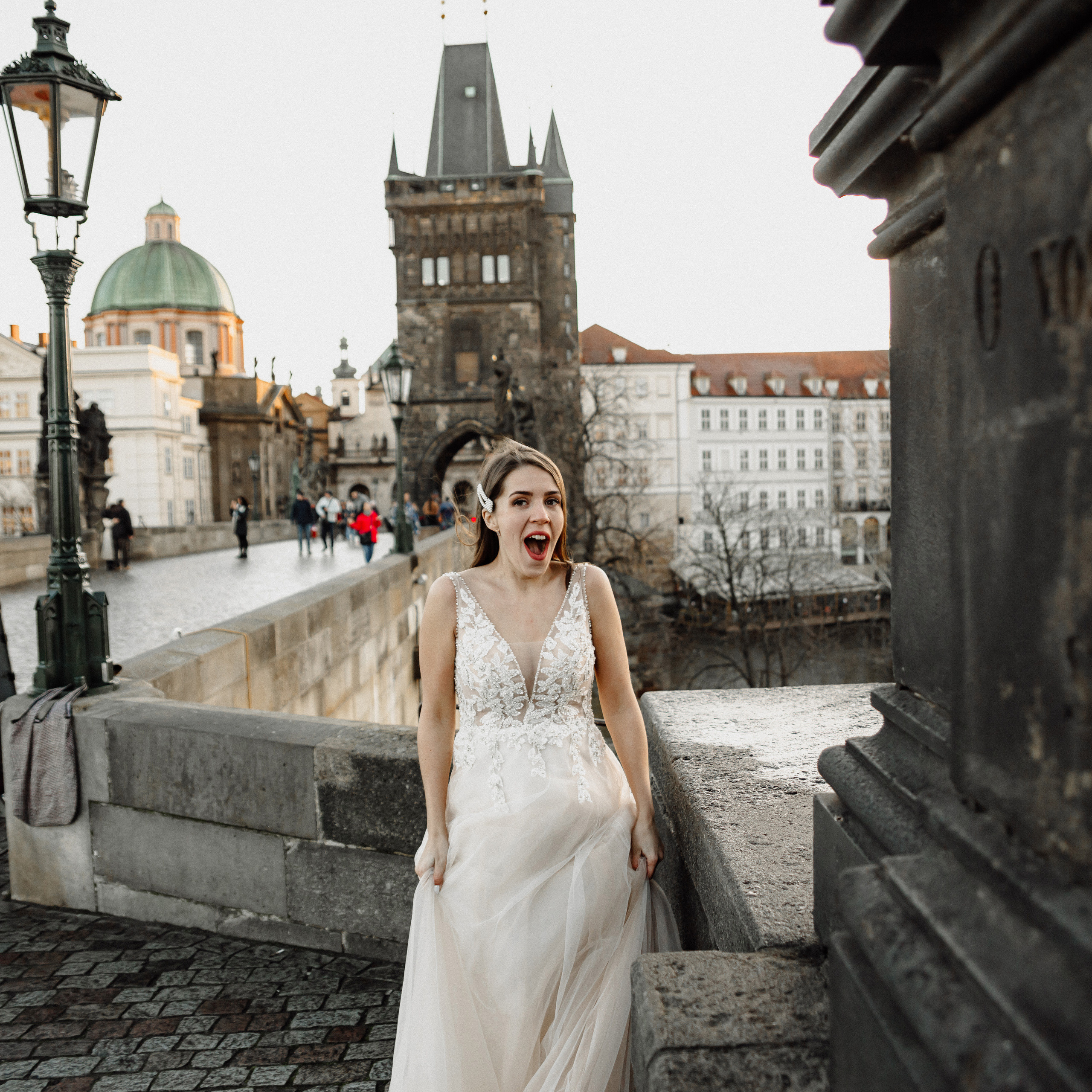 Christmas elopement of a couple in Prague. Wedding and portrait photographer in Poland Vitali Frozen