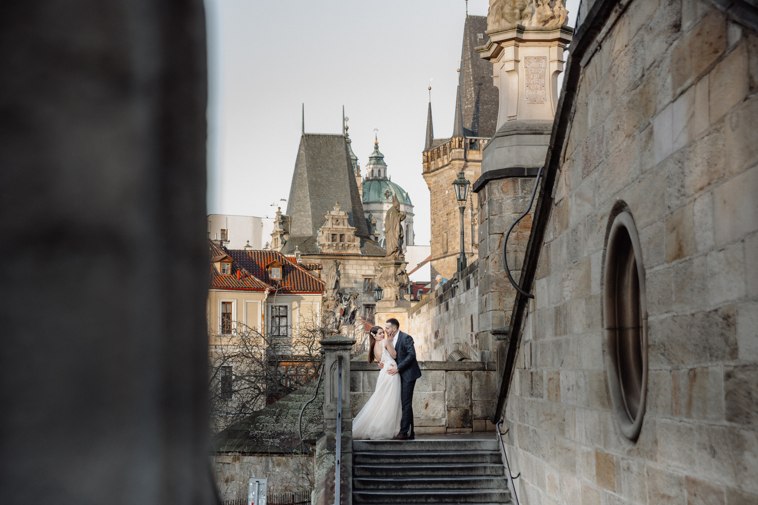 Christmas elopement of a couple in Prague. Wedding and portrait photographer in Poland Vitali Frozen