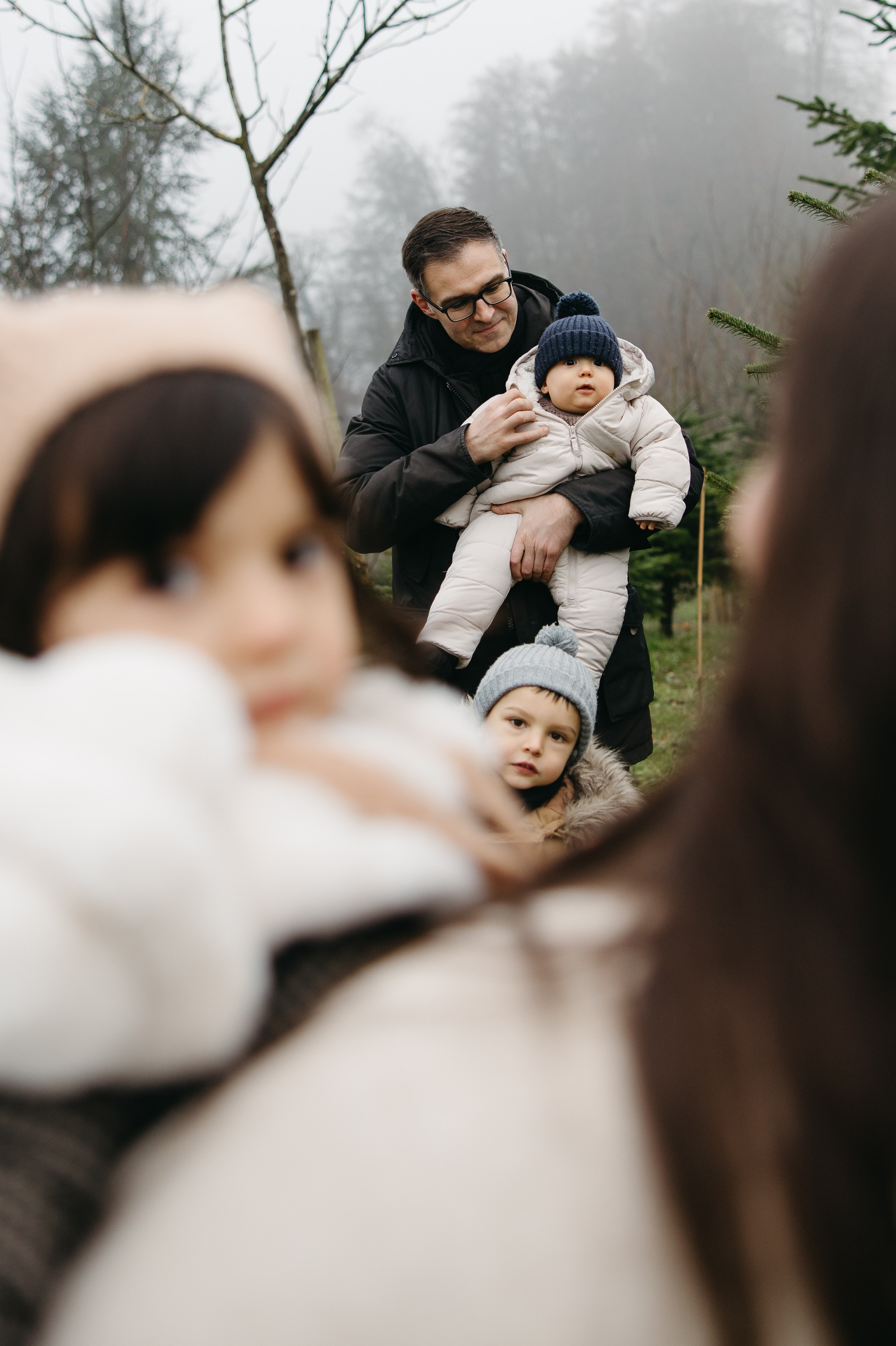 Family Christmas photoshoot. Family photographer in Bern, Switzerland