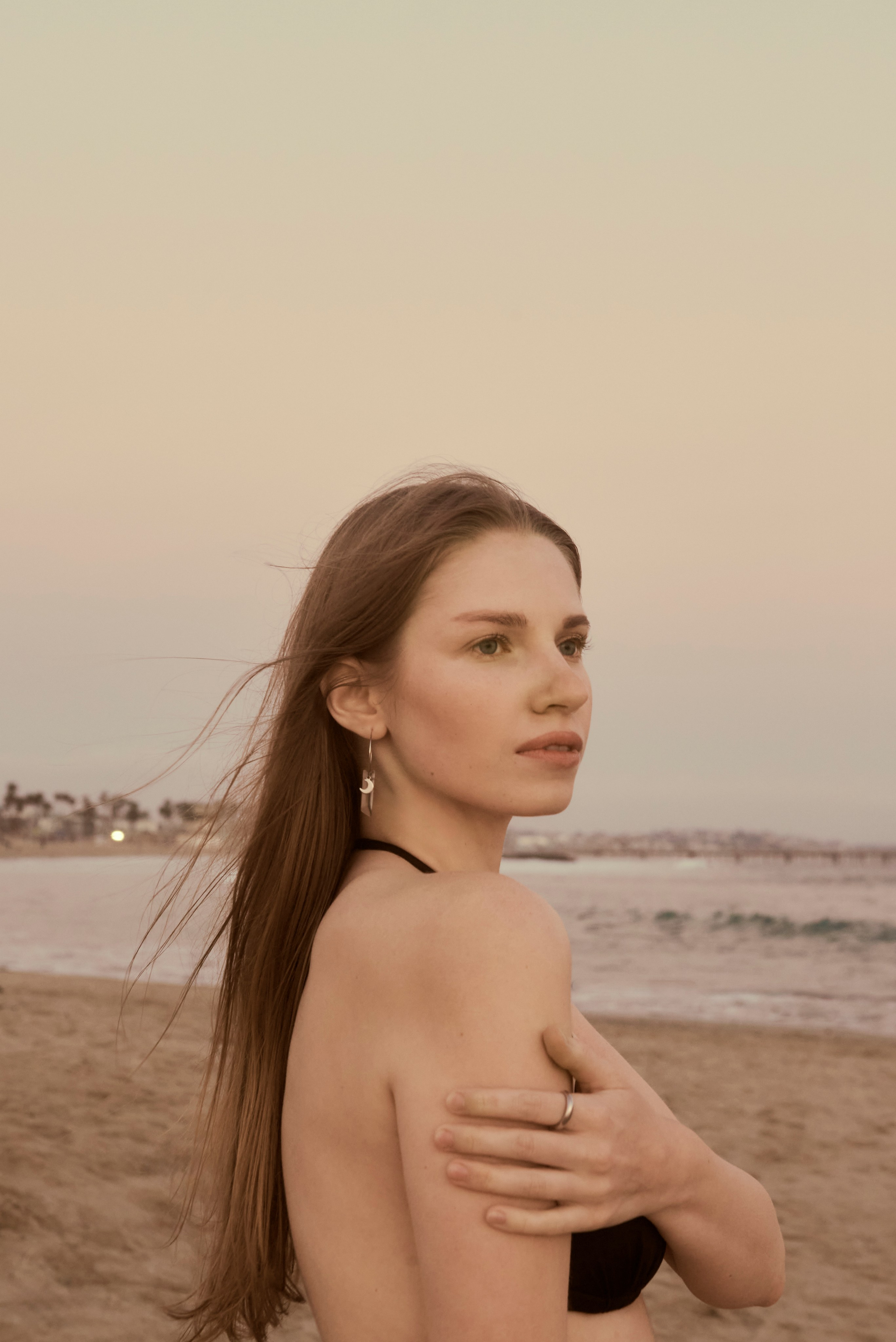 Santa Monica Beach: girl with long hair against the sunset