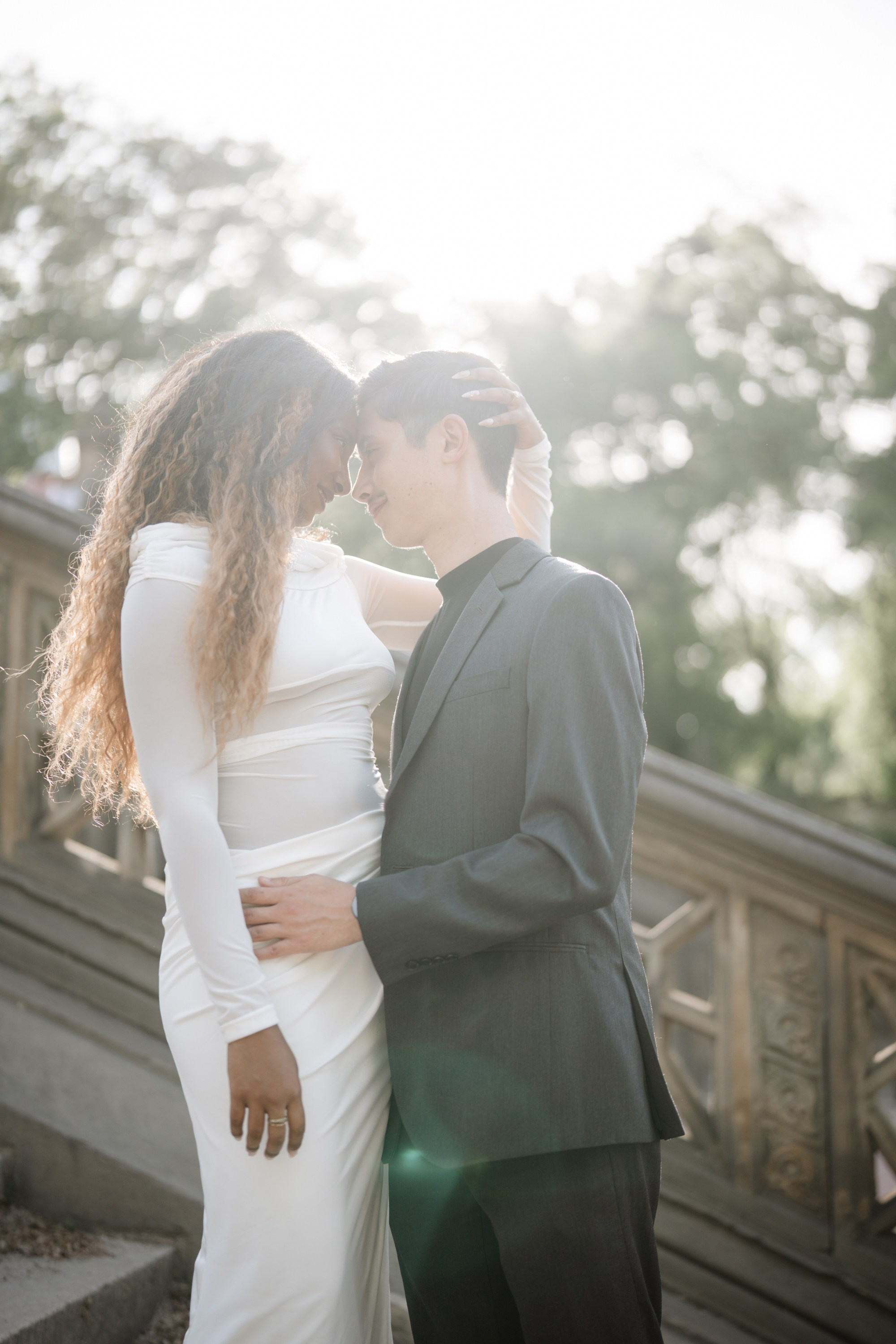 Engagement photo shoot in Central Park in spring. Portrait and wedding photographer in New York