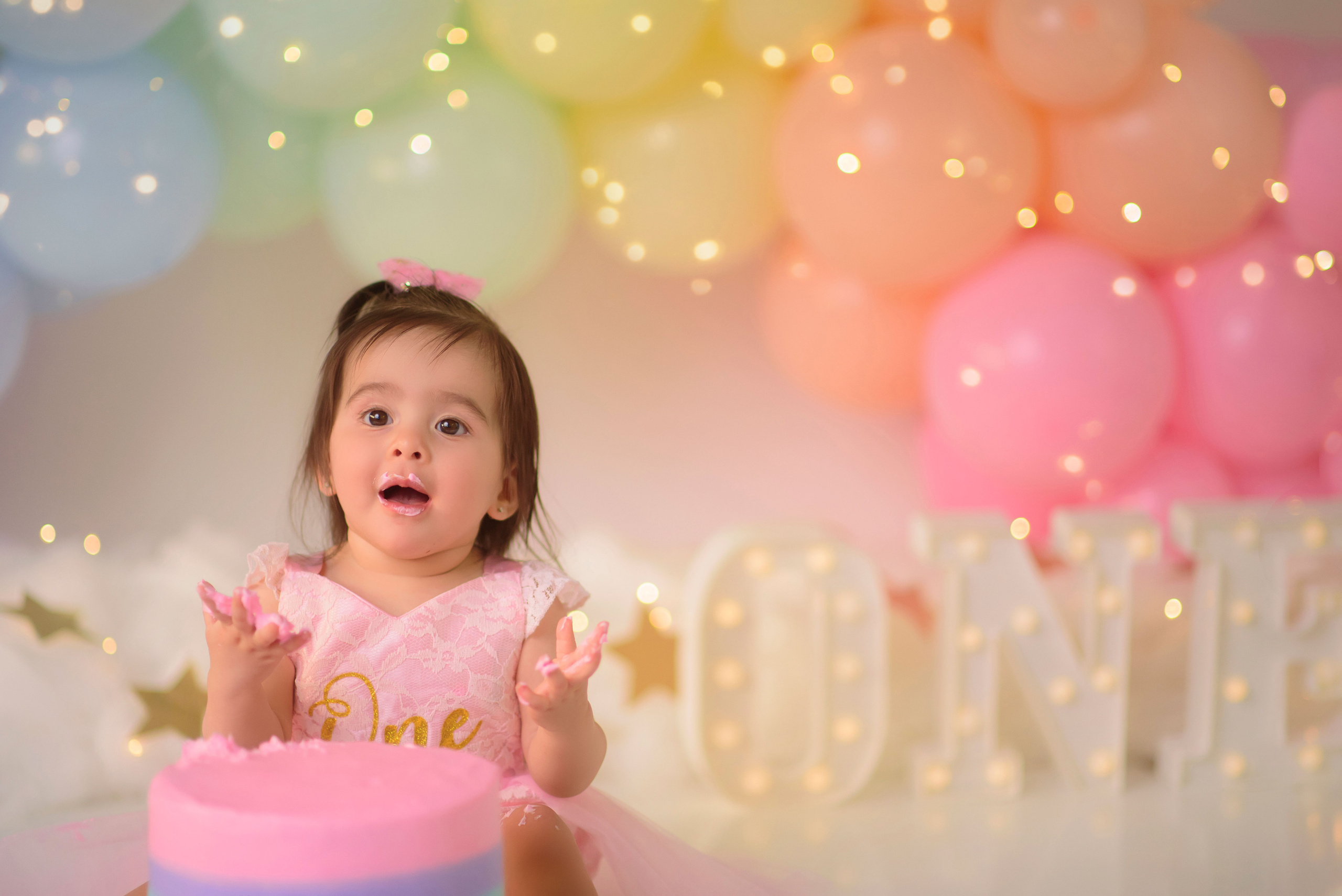 Rainbow cake smash Sacramento, Roseville, Rocklin baby photographer. Family photographer in Roseville, Rocklin, Folsom, Sacramento