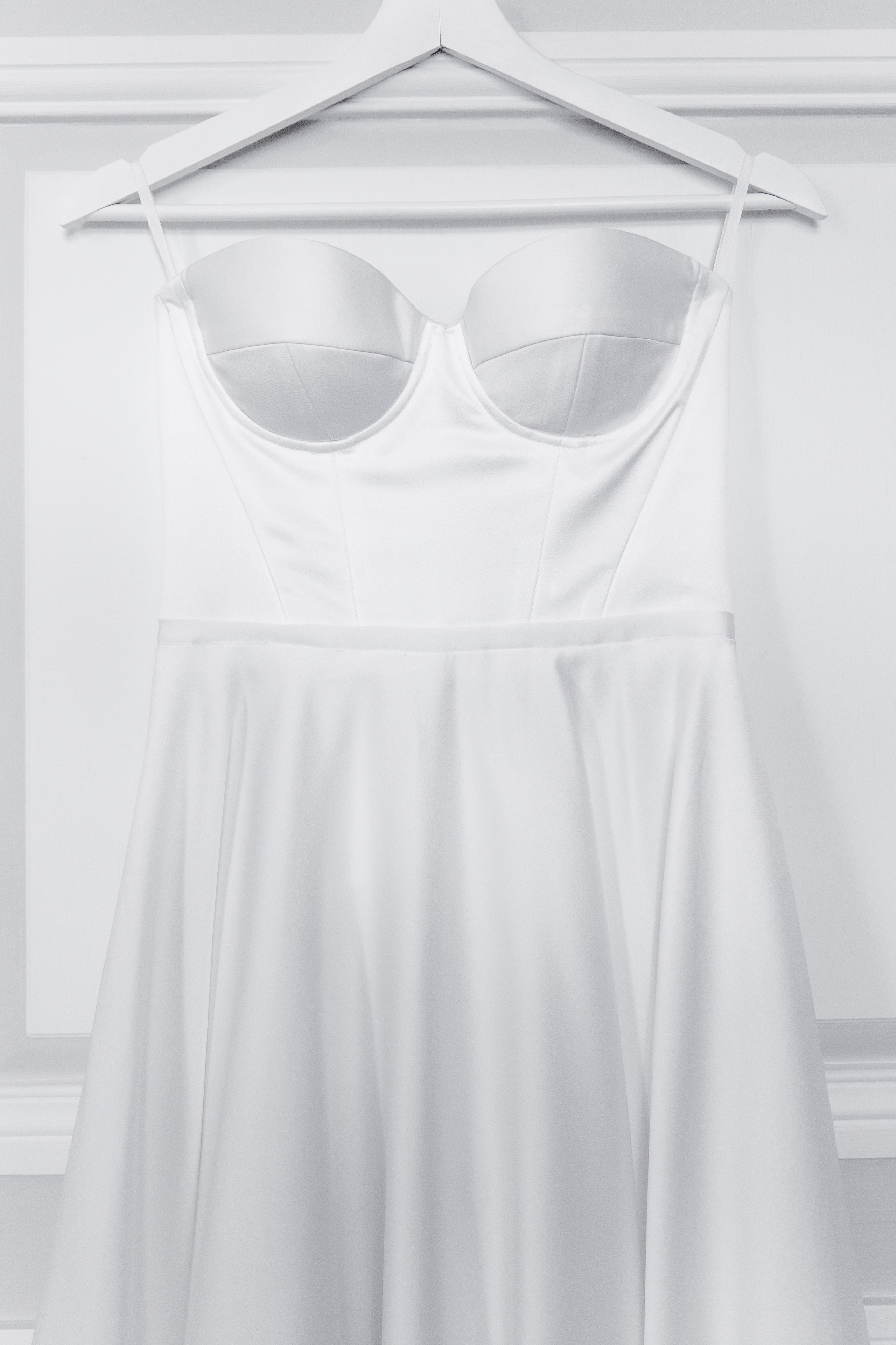 Intricate details of a bride's wedding dress captured in a French wedding photoshoot.