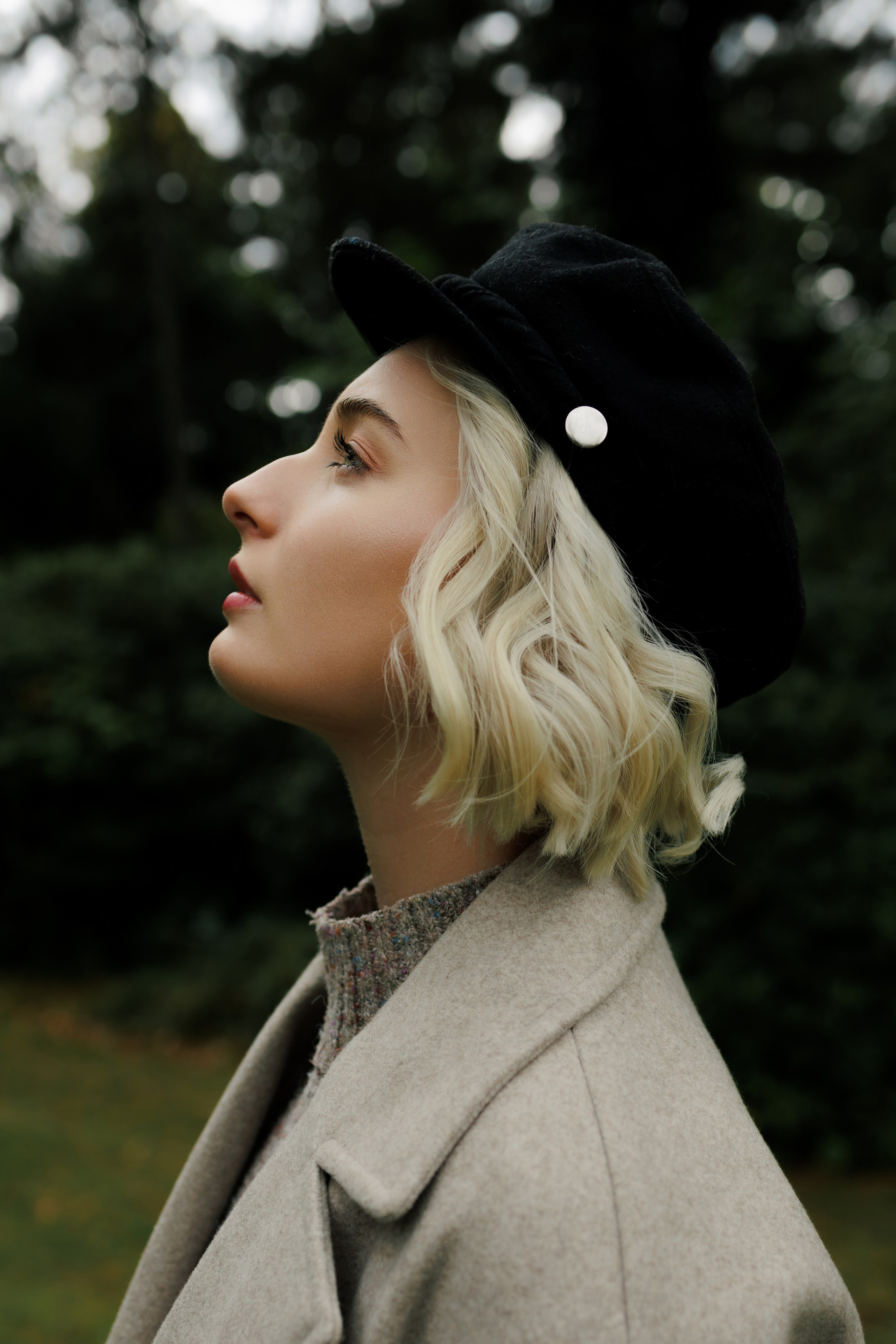 Autumn Portrait in the Park. Woman in Coat&Sweater. Cinematic&Emotional Photography by Kristina Kozheltsova. Kristina Kozheltsova- Soulful Portrait&Lifestyle&Love Story Photographer in Leipzig, Germany