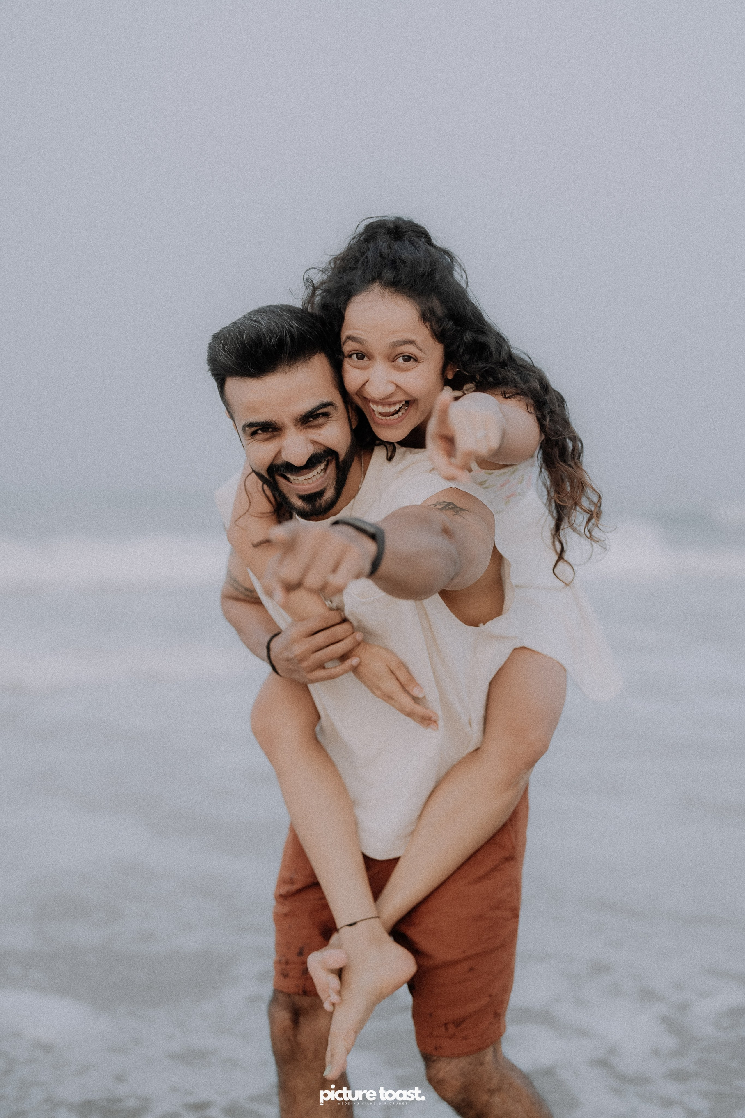 Love In The Beach. Fine art Wedding Photographers in India & Canada