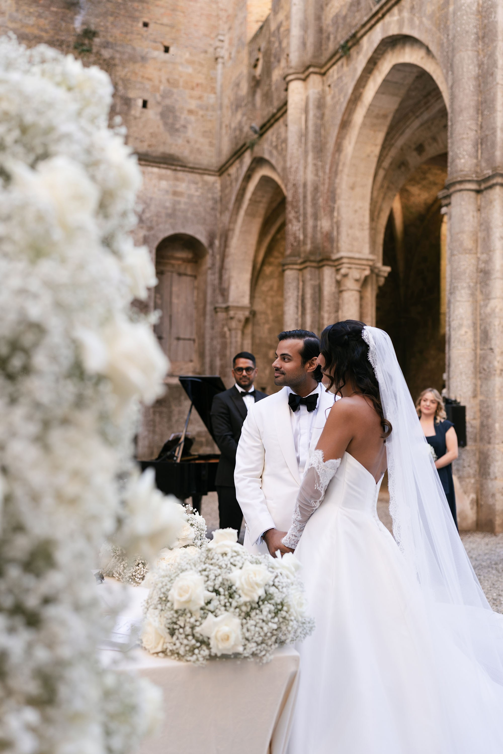 Ginevra and Avi — Abbazia di San Galgano, Tuscany. Destination Wedding Photographers and content creators based in Spain