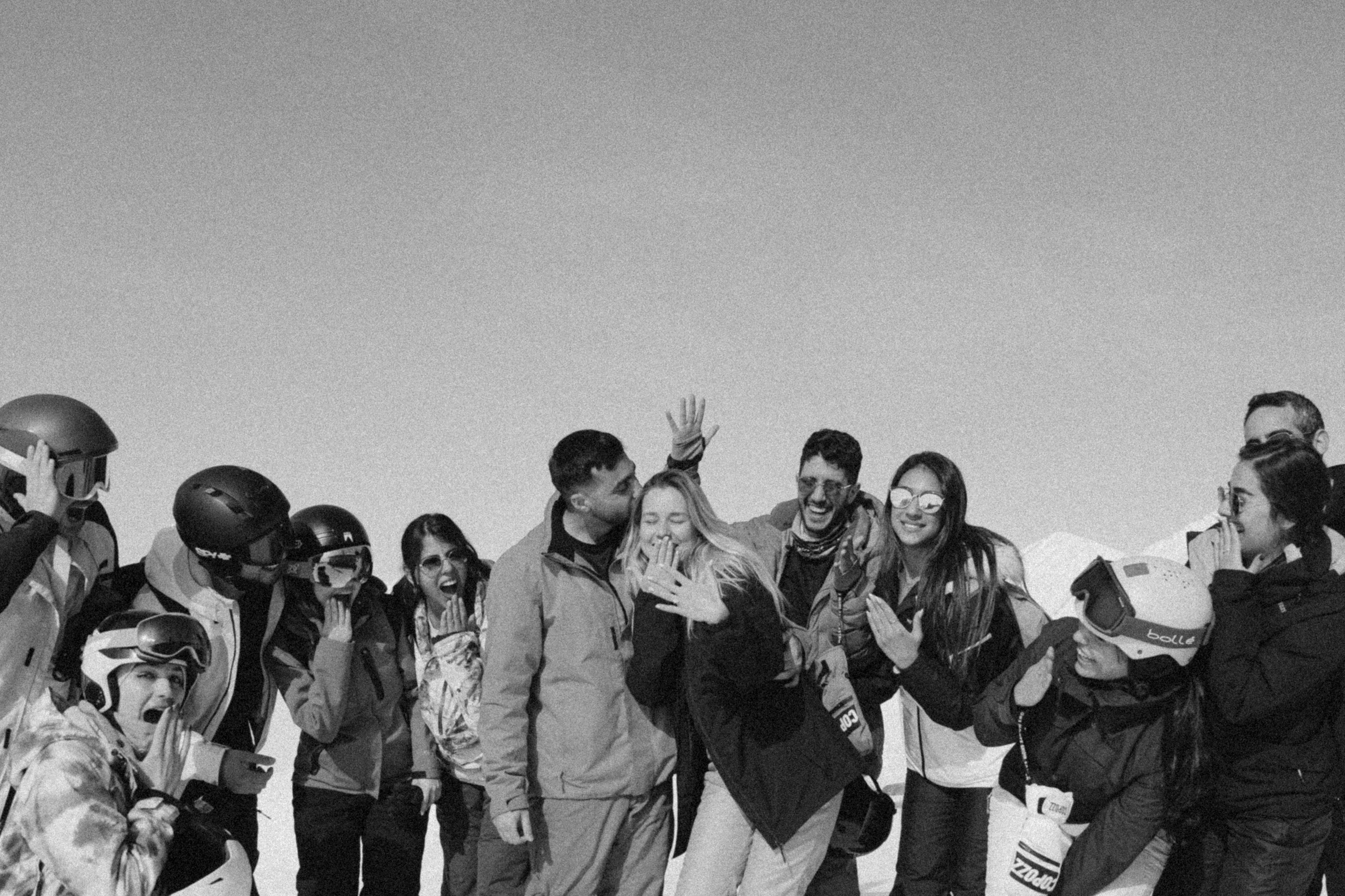 Couple with firends during winter engagement shoot in Gudauri