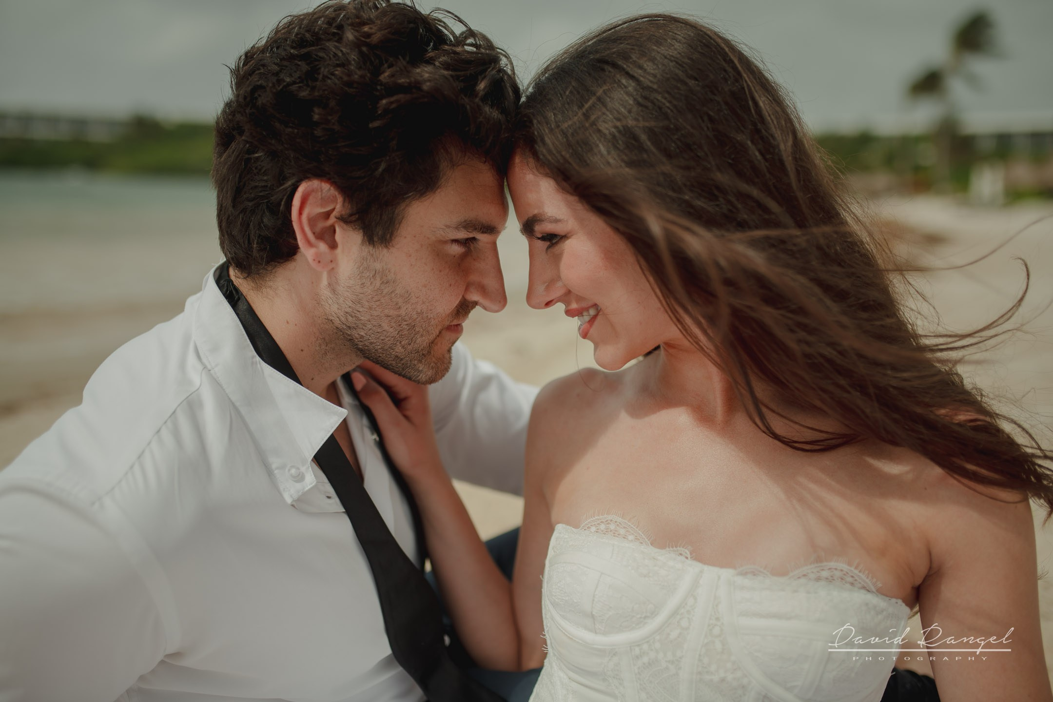 Secilia and Brandon tras the dress at the Conrad Tulum Hotel. Destination wedding photographer based in Cancun and Riviera Maya with service worldwide