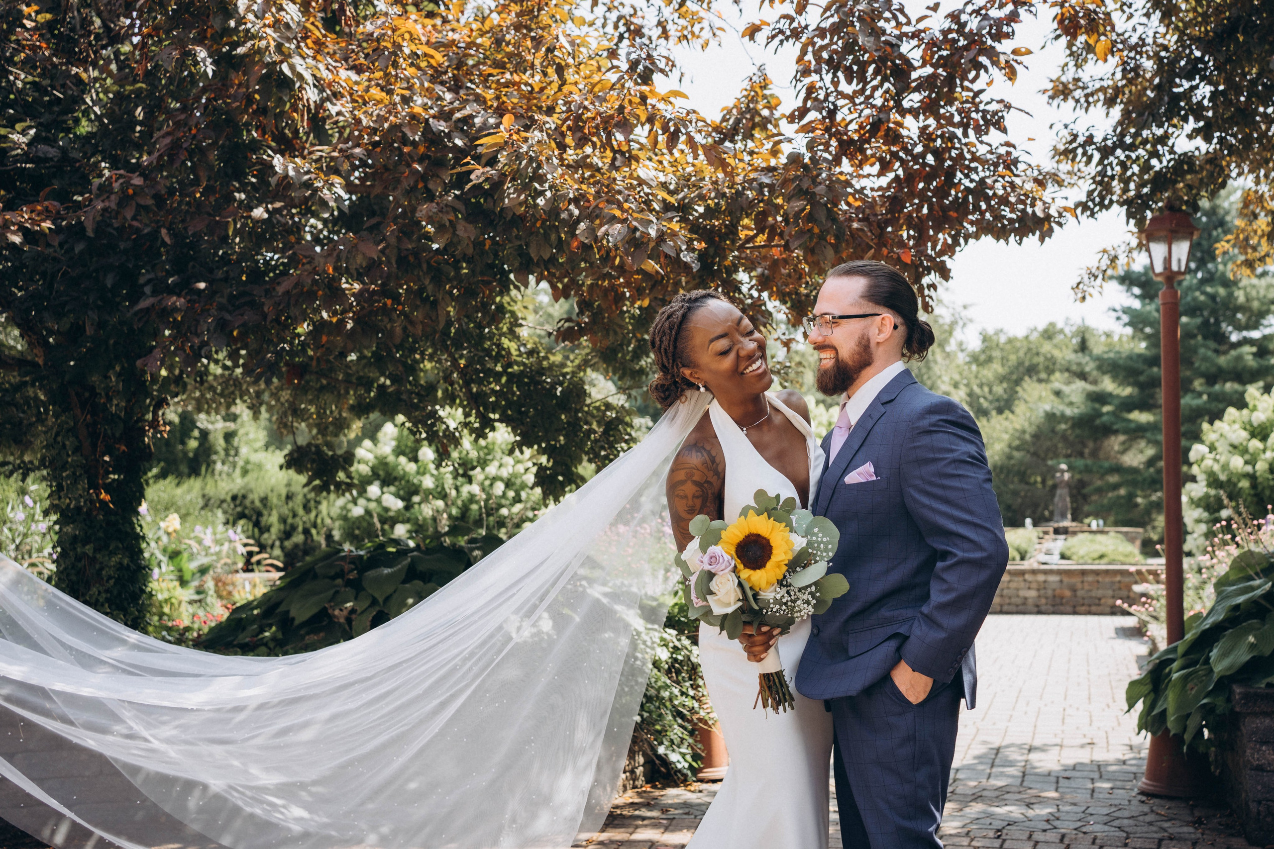 Romantic floral centerpiece photography at elegant wedding