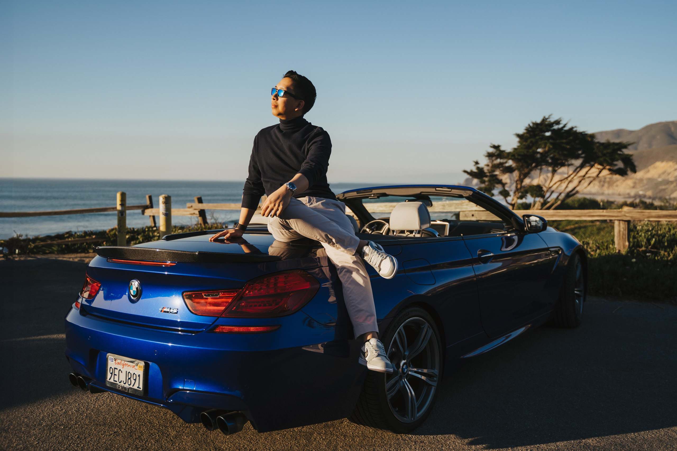 A photo shoot on the San Francisco beach at sunset. Engagement session. 