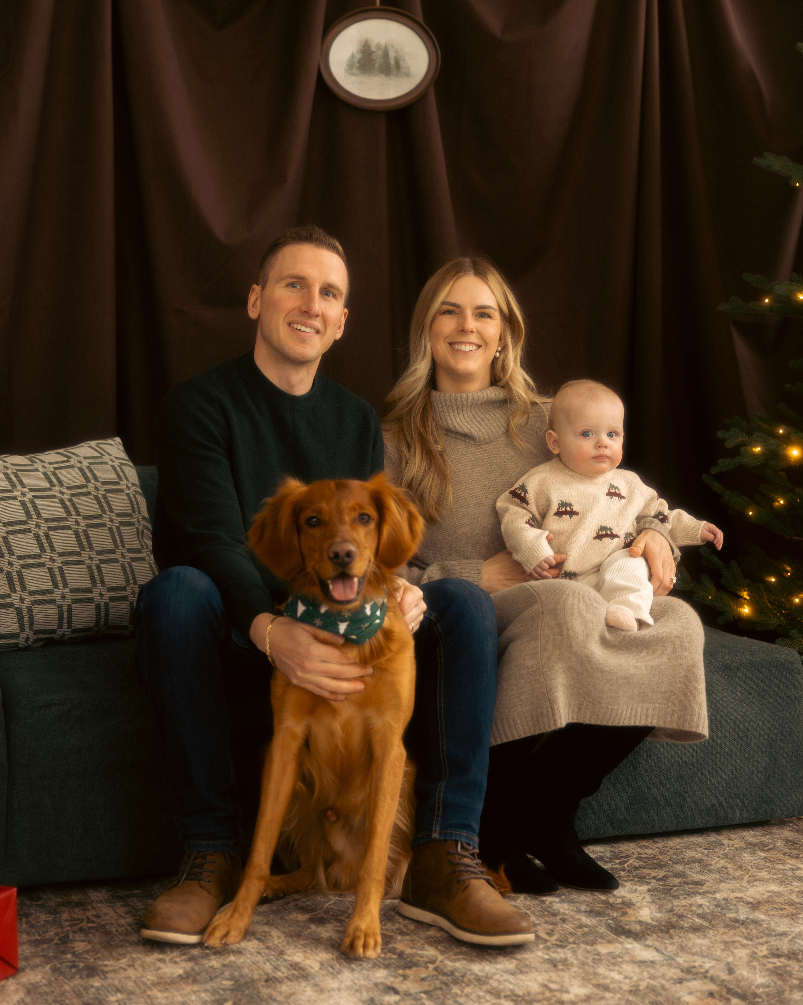 Mother holding her baby during a cozy Christmas mini session in Chicago