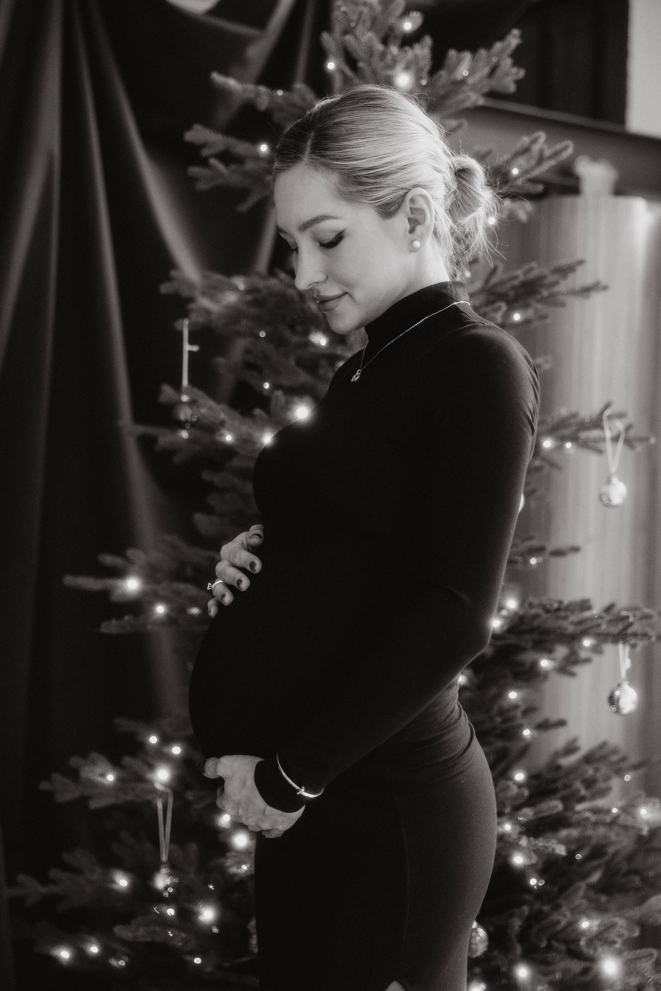 Black and white maternity portrait during a Christmas photo session in Chicago