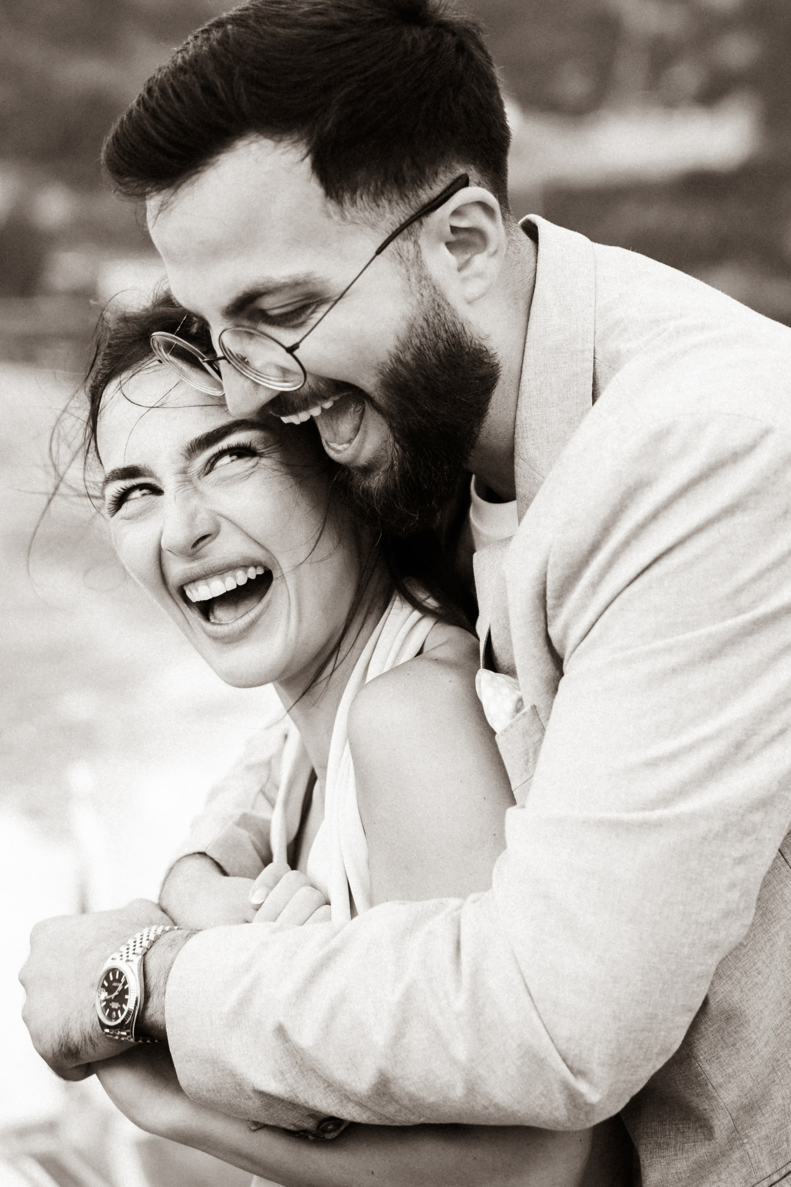 Couple laughing together during their romantic Lake Como engagement