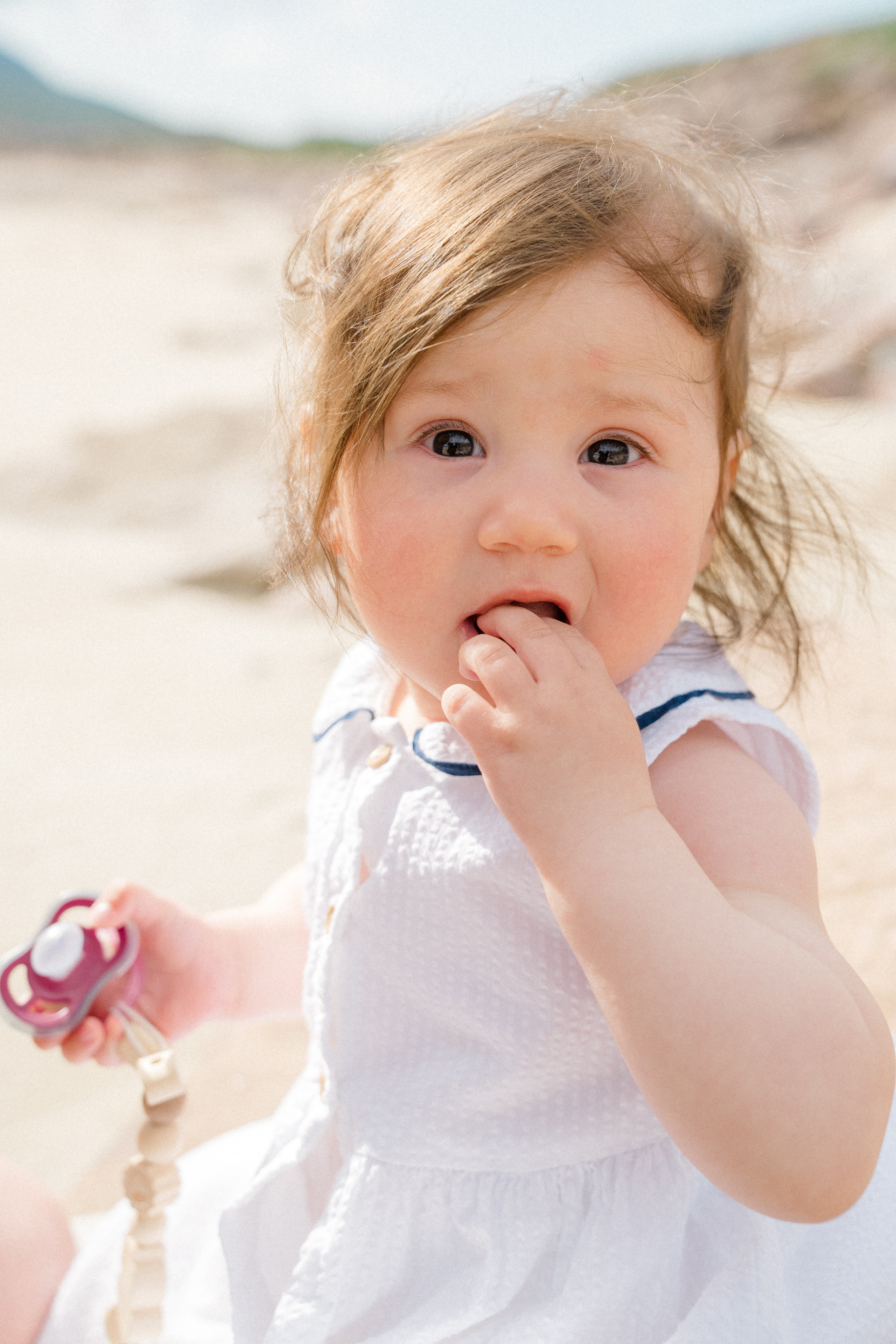 Darya and Mia at the ocean. Wedding and family photographer Ireland