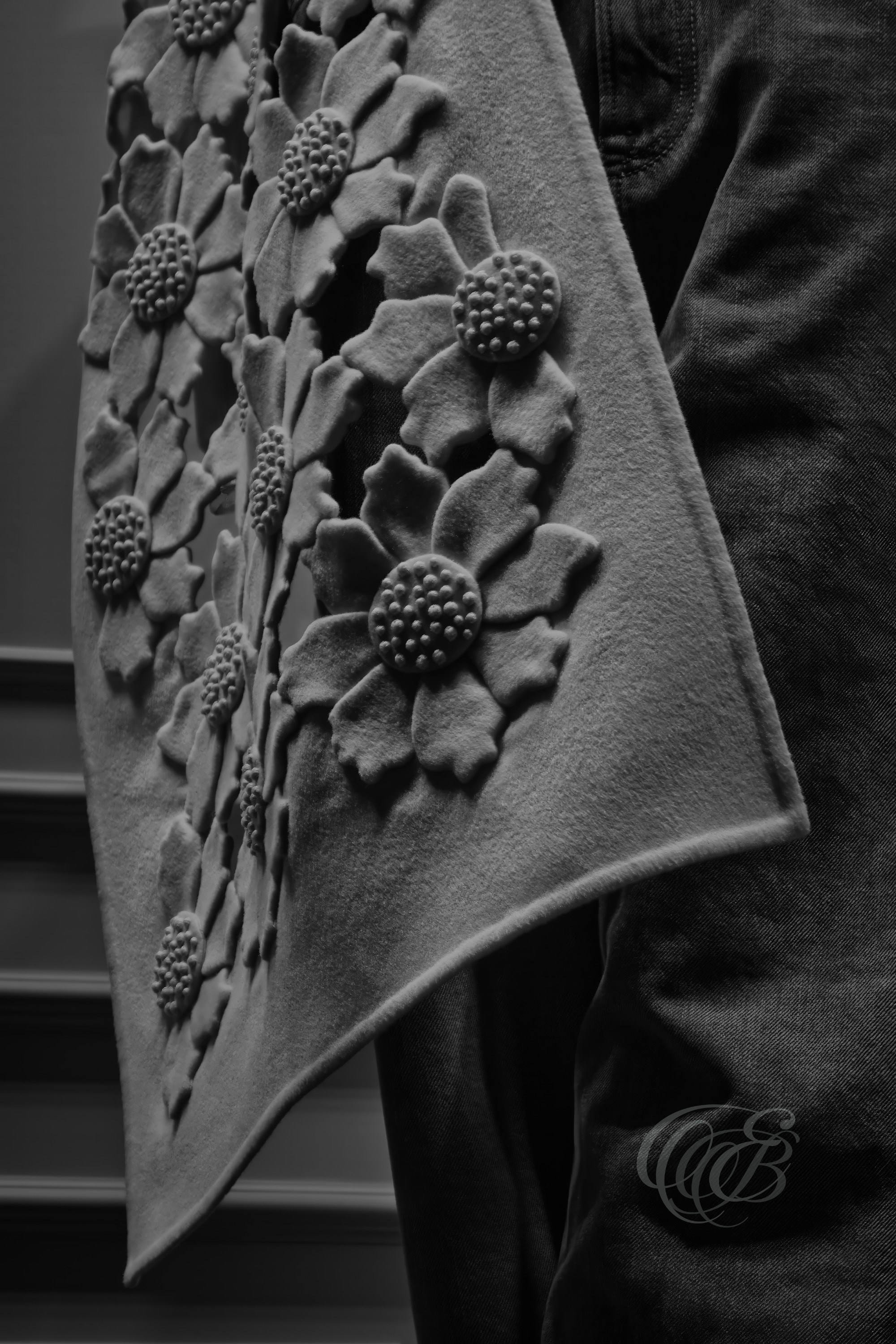 Rome, Italy – Close-up black and white detail of clothing and fabric textures inside Valentino boutique, luxury fashion materials and textile study – fashion photography, Valentino Rome Valentino store interior detail – Eduardo Bartoli Photography.