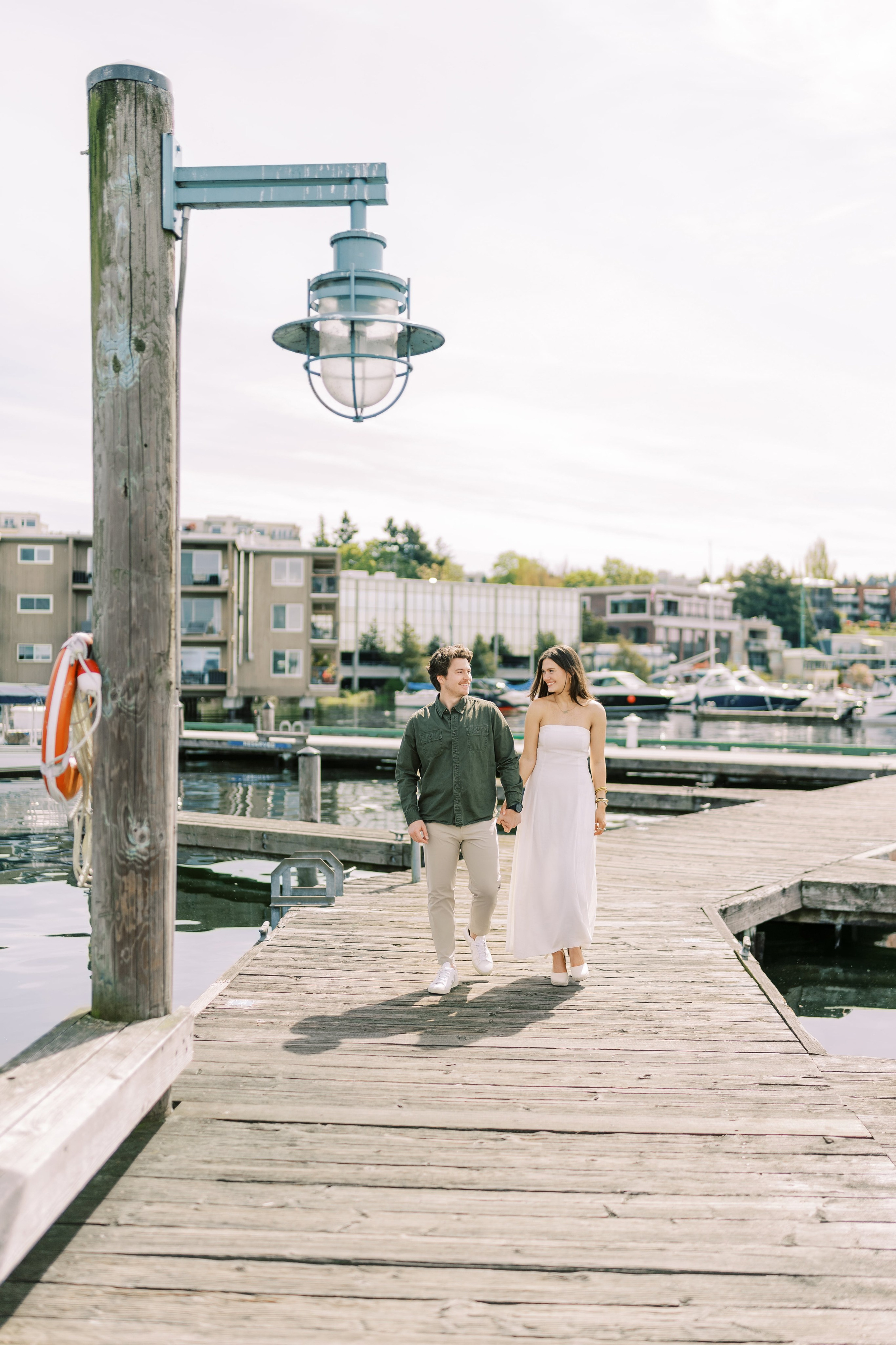 Engagement photo shoot Jake & Caroline / May 2024. Marina Park|Kirkland, WA. EVAN ARISTOV WEDDING PHOTOGRAPHY — Seattle Wedding Photographer