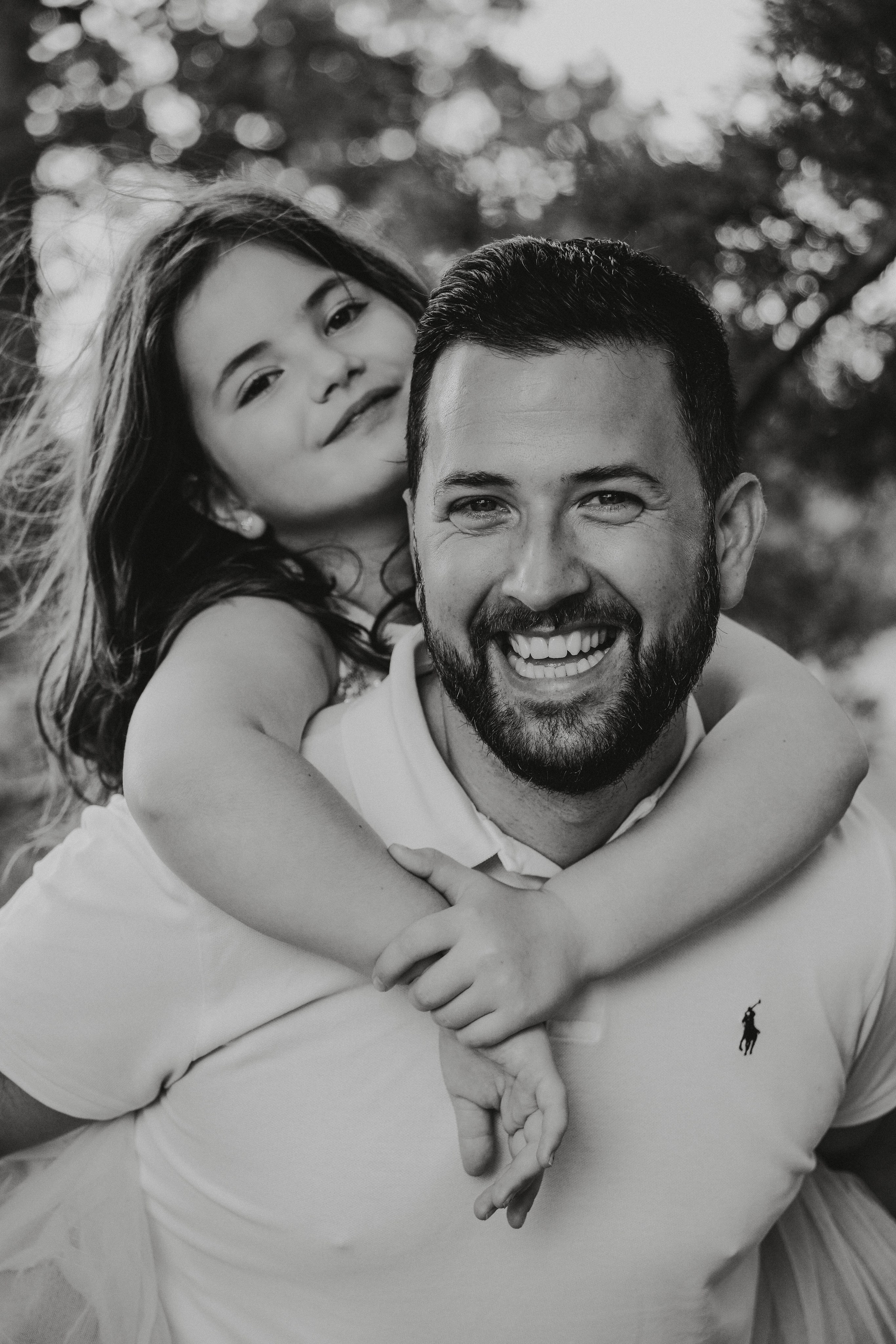 Family photo shoot in Solihull and Birmingham, Daughter is hugging dad