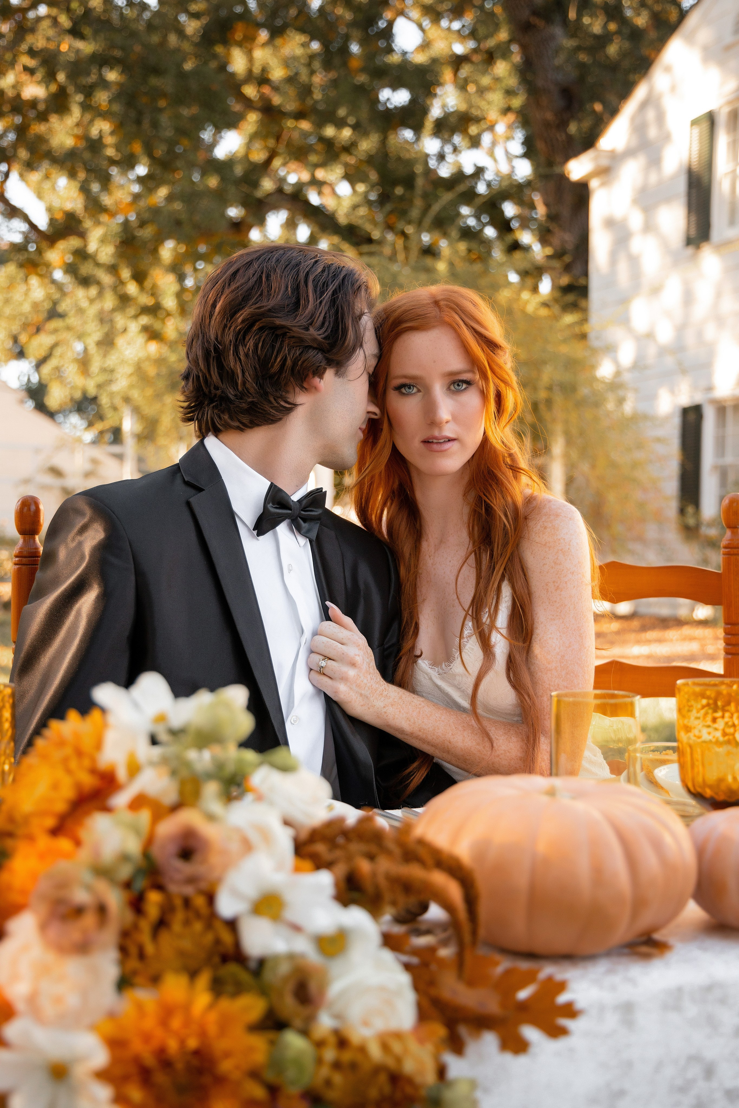 The couple's reflection in a shimmering lake, a stunning shot from their Bay Area photo session.