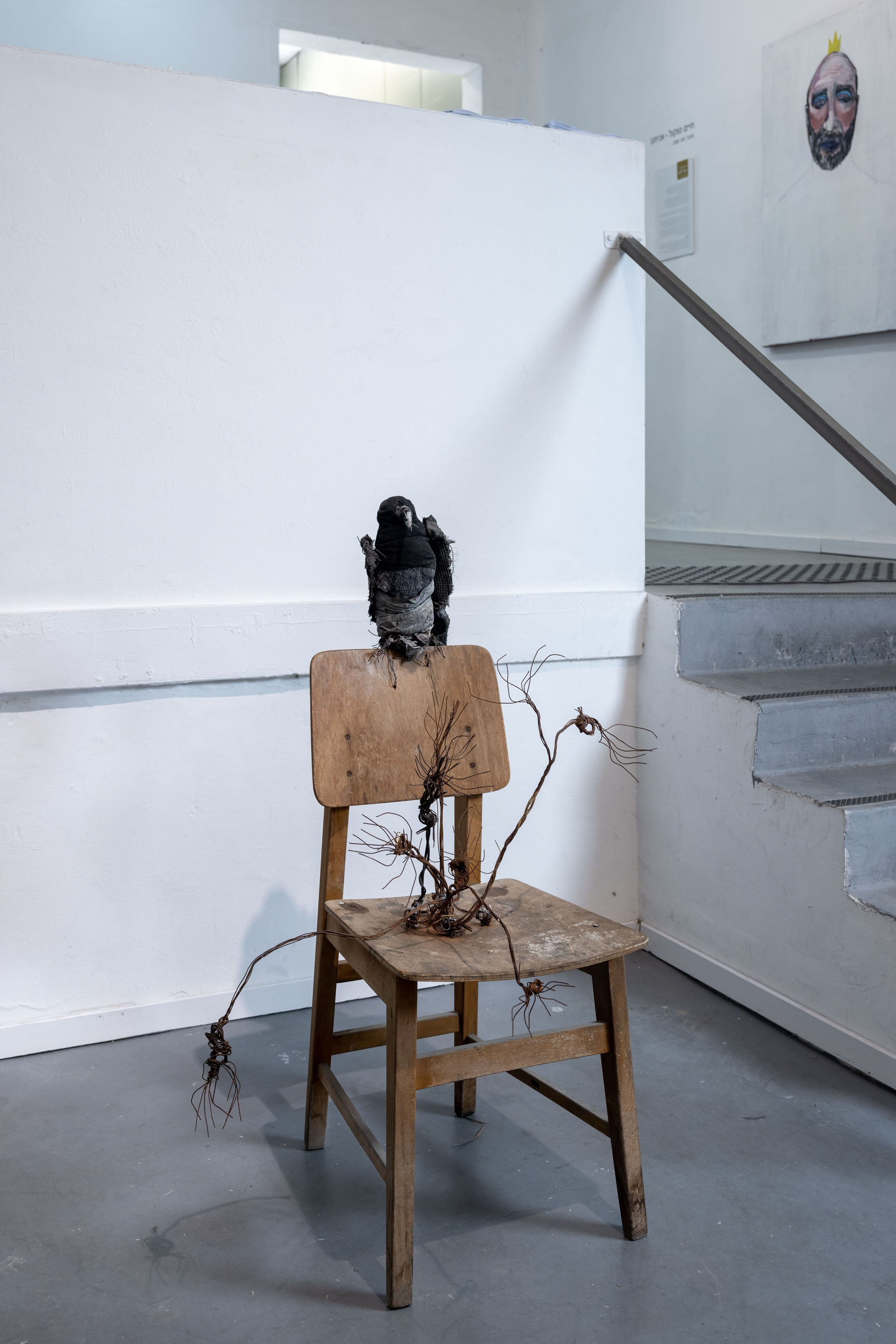 Bird and rusted flowers on chair, 2024. Haim Sokol’s artists website