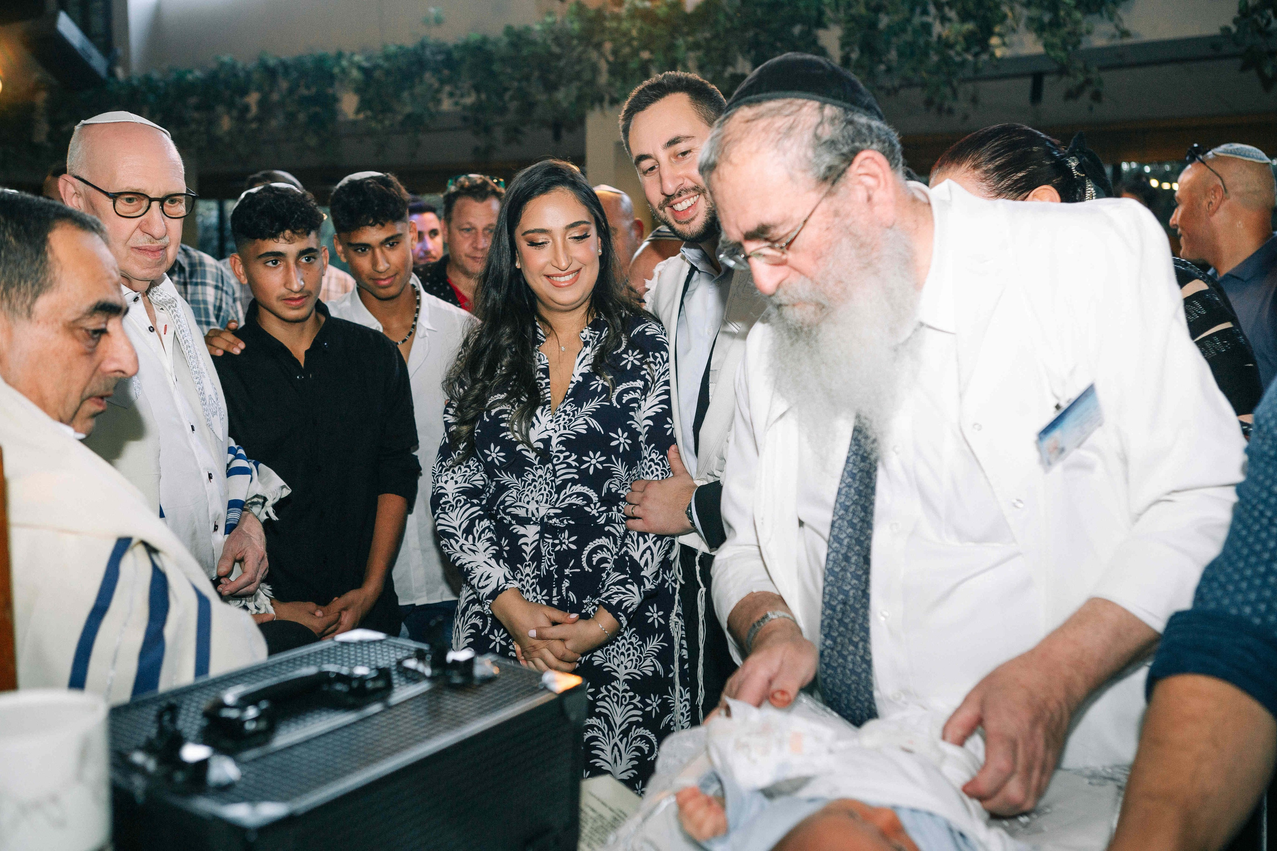 BRIT MILA (BIG EVENT). PHOTOGRAPHER IN ISRAEL