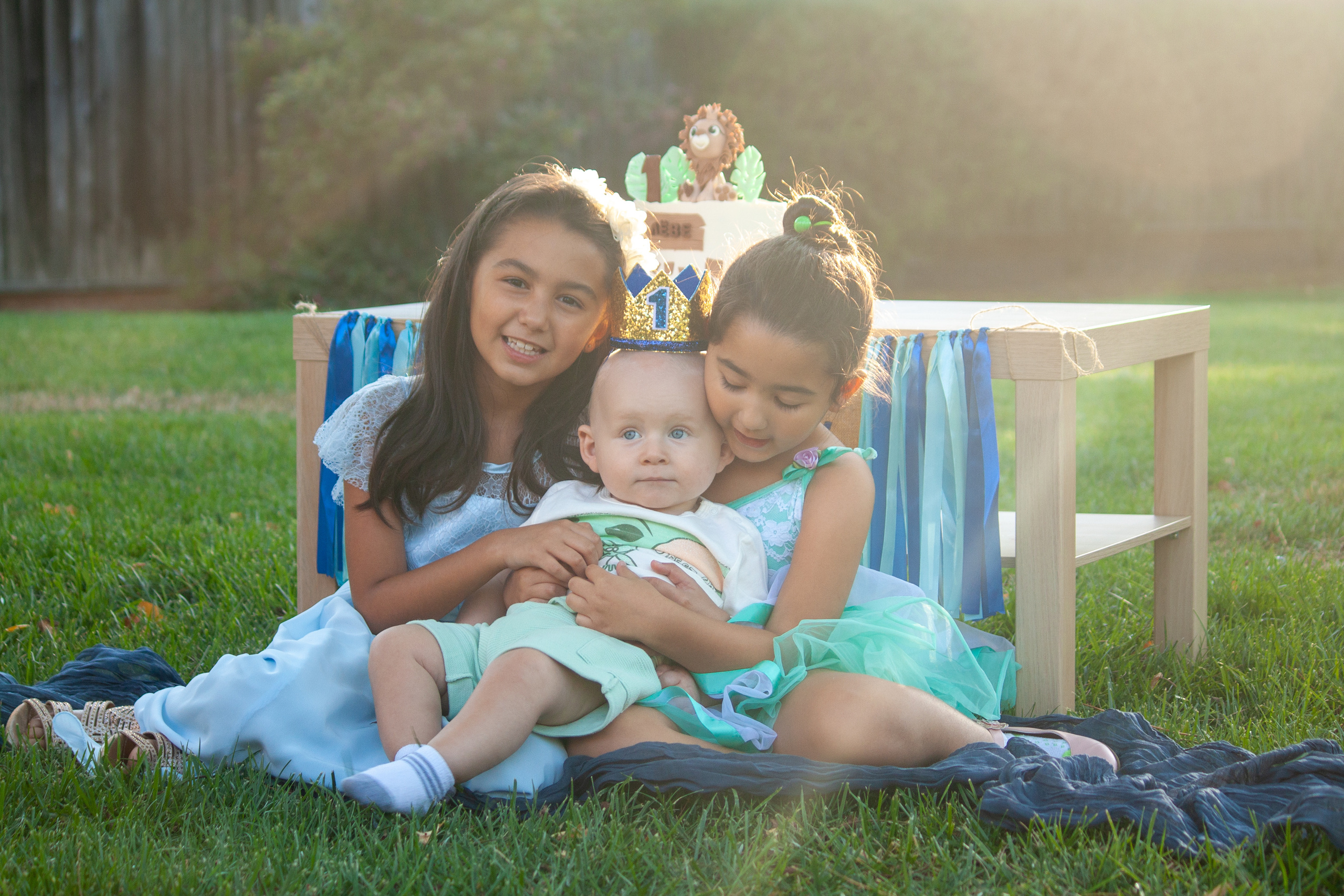 A sunny day in a clearing where a photographer takes pictures of a child's birthday
